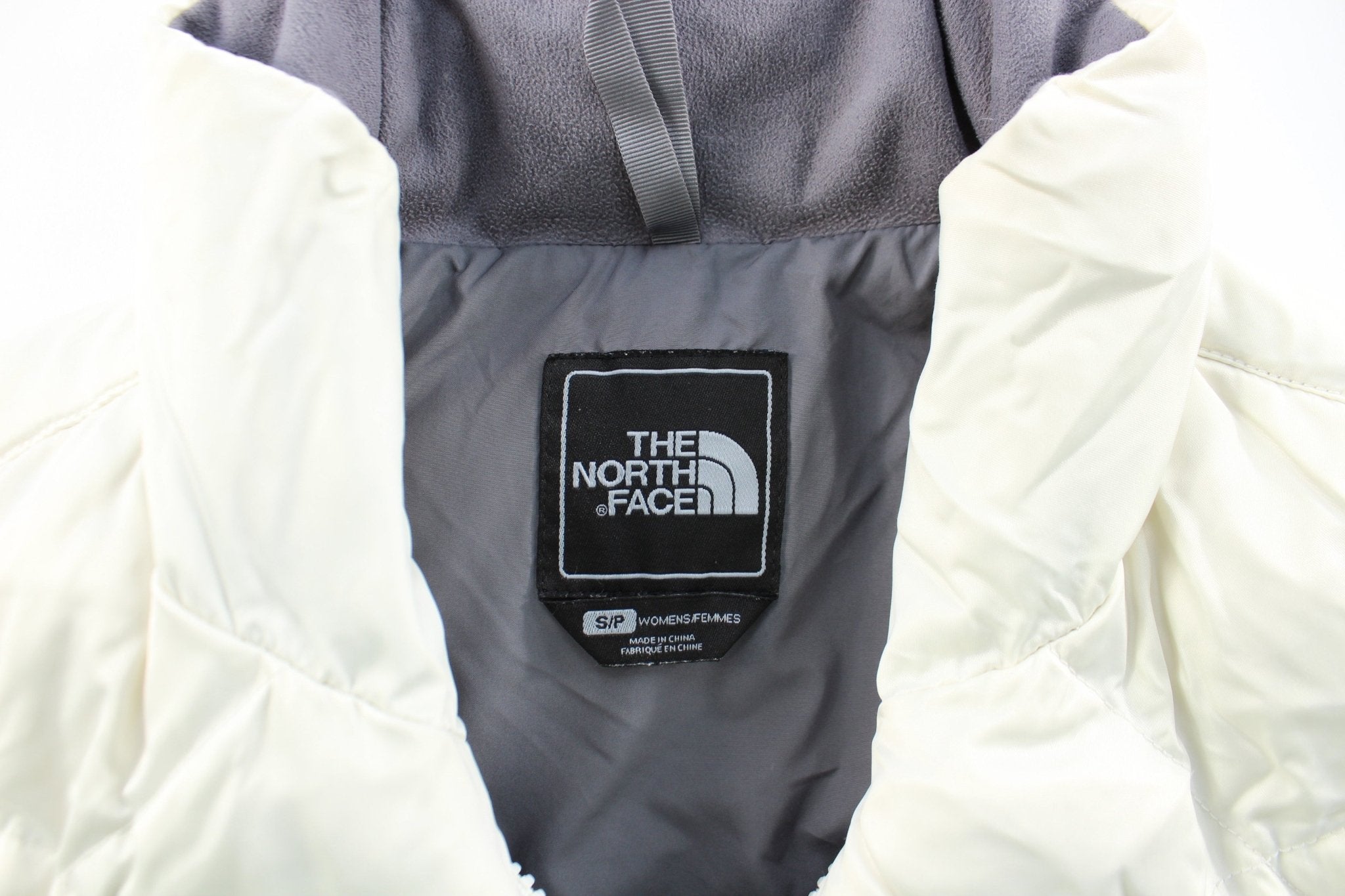 Women's The North Face 550 White Puffer Zip Up Vest - ThriftedThreads.com