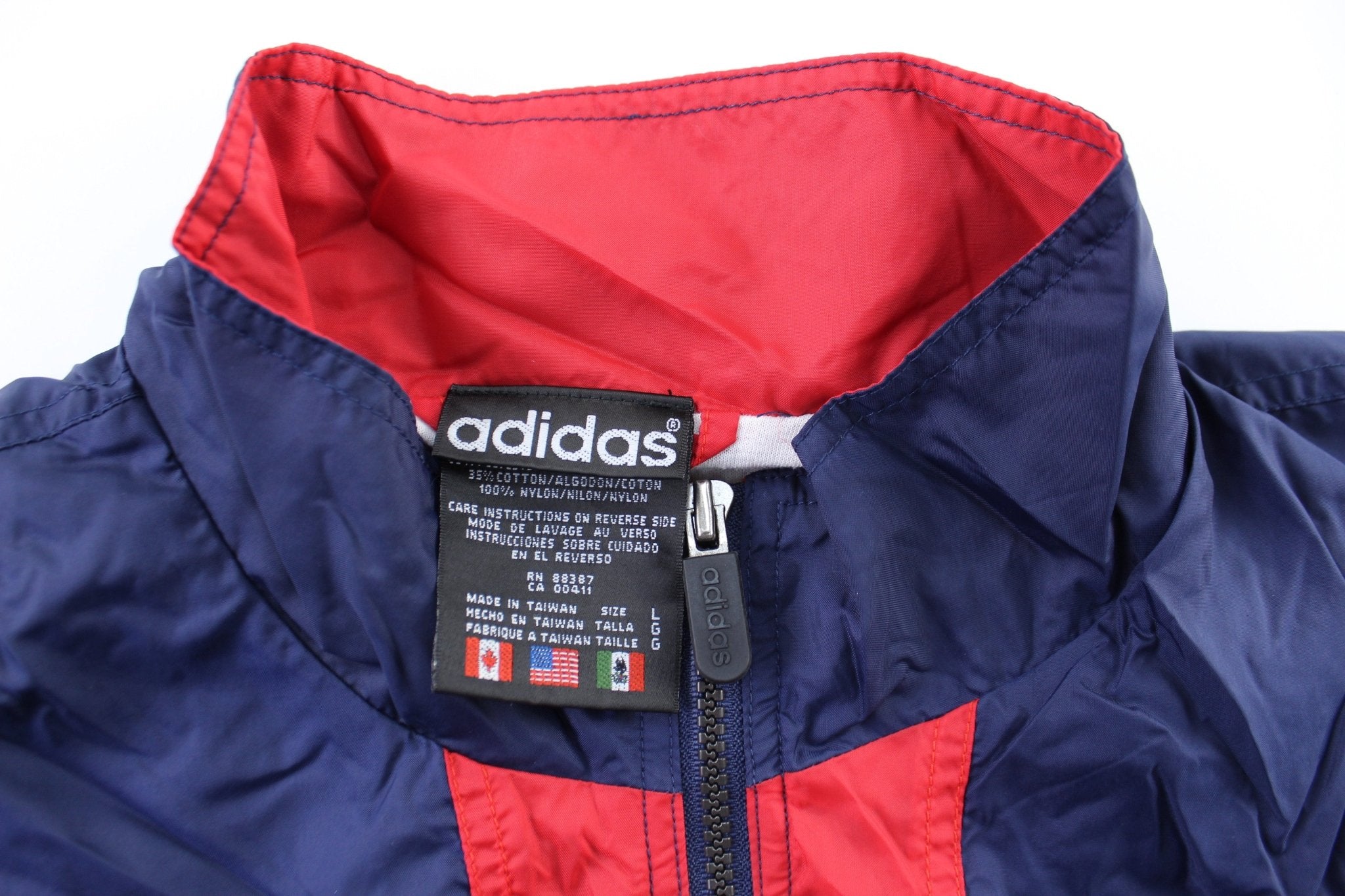 90's Adidas Embroidered Logo Navy Blue, Red, & White Striped Zip Up Jacket - ThriftedThreads.com