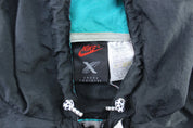 90's Nike Cross Training White, Black, & Turquoise Windbreaker Jacket - ThriftedThreads.com