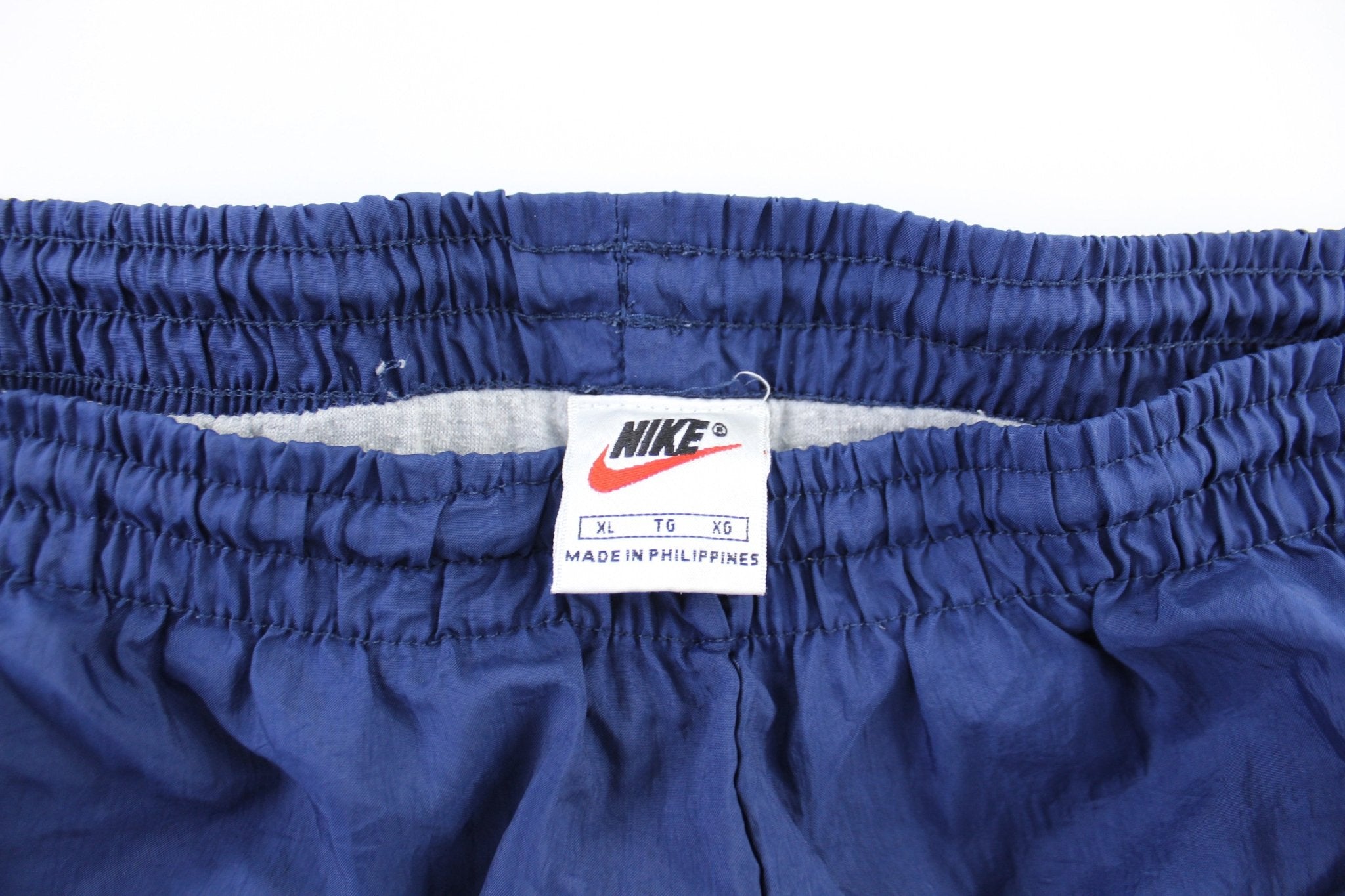 90's Nike Embroidered Logo Navy Blue Pants - ThriftedThreads.com