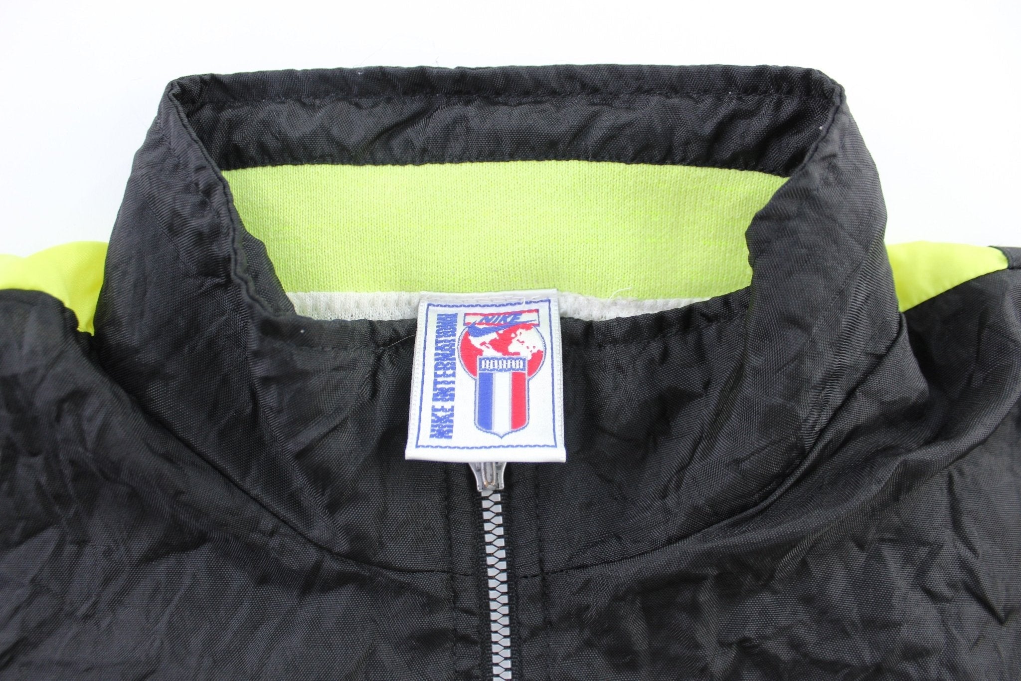 90's Nike International Embroidered Black, White, & Neon Zip Up Jacket - Jackets - Thrifted Threads