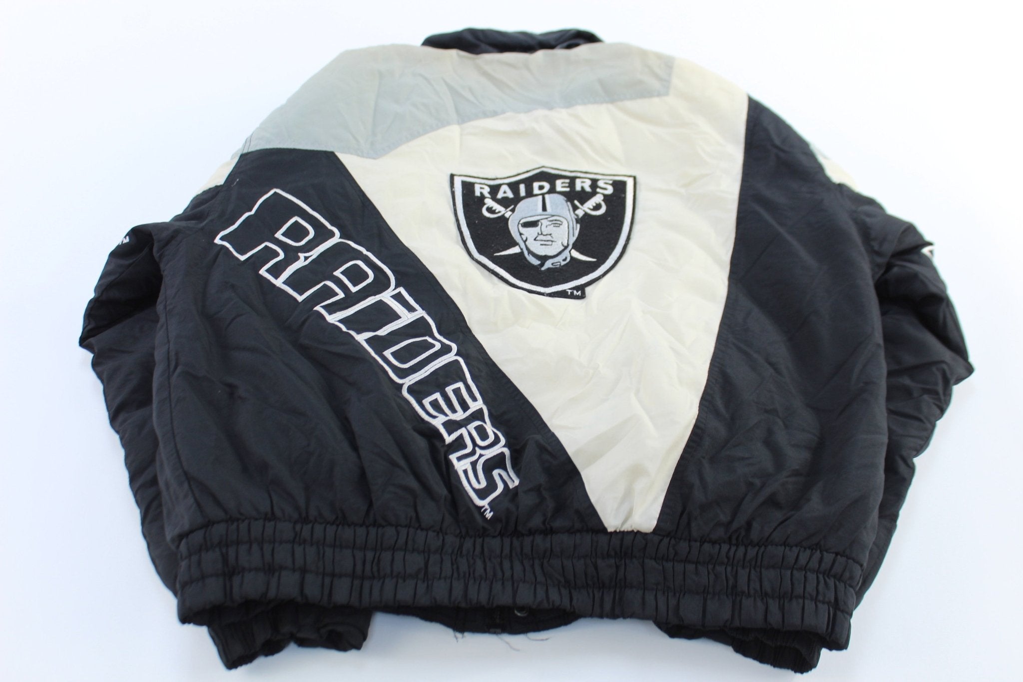 90's Raiders Football Embroidered Puffer Jacket - ThriftedThreads.com