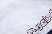90's Reebok Embroidered Logo Blue & White Slip Zip Up Jacket - ThriftedThreads.com