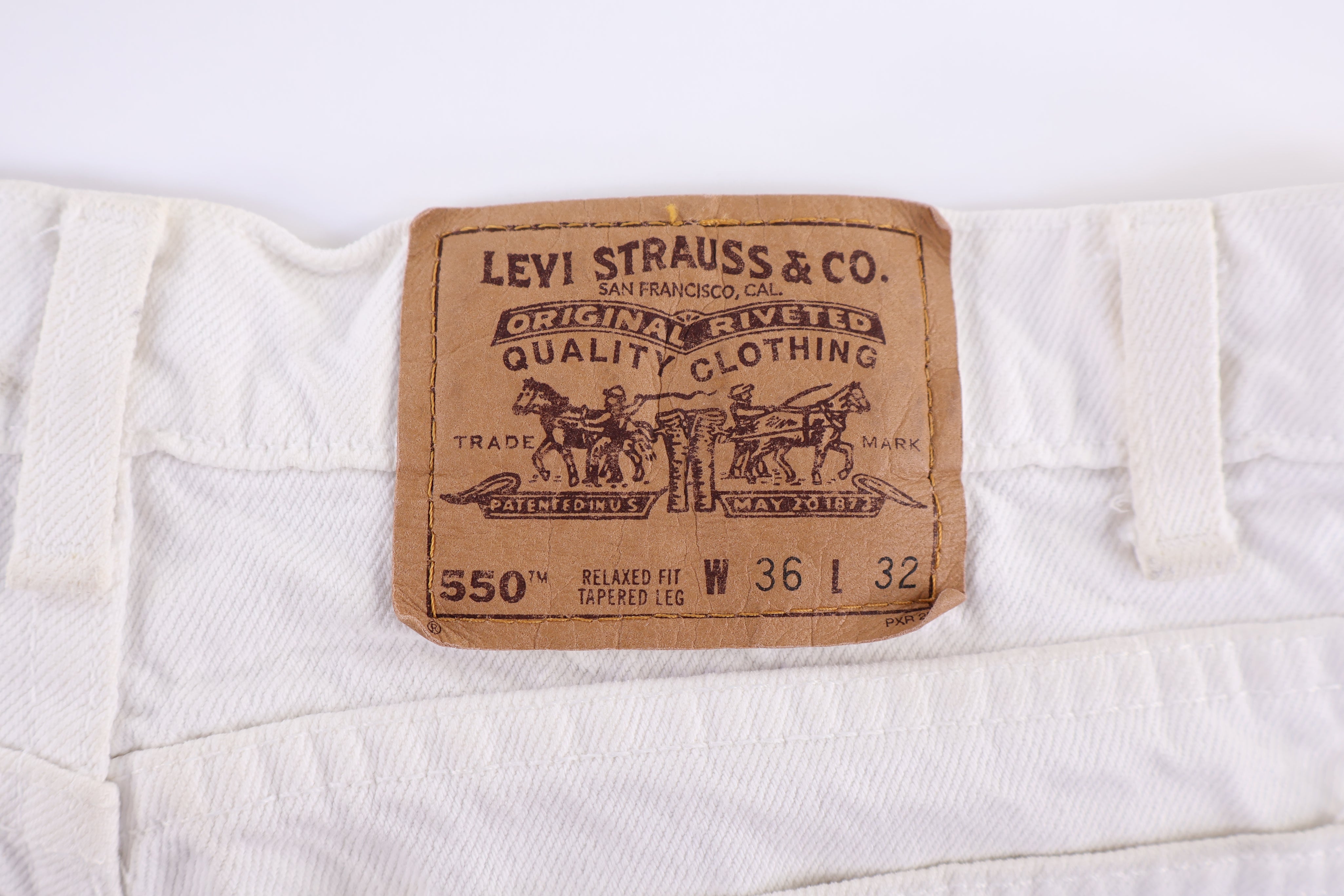 90's Levi's 550 White Denim Jeans