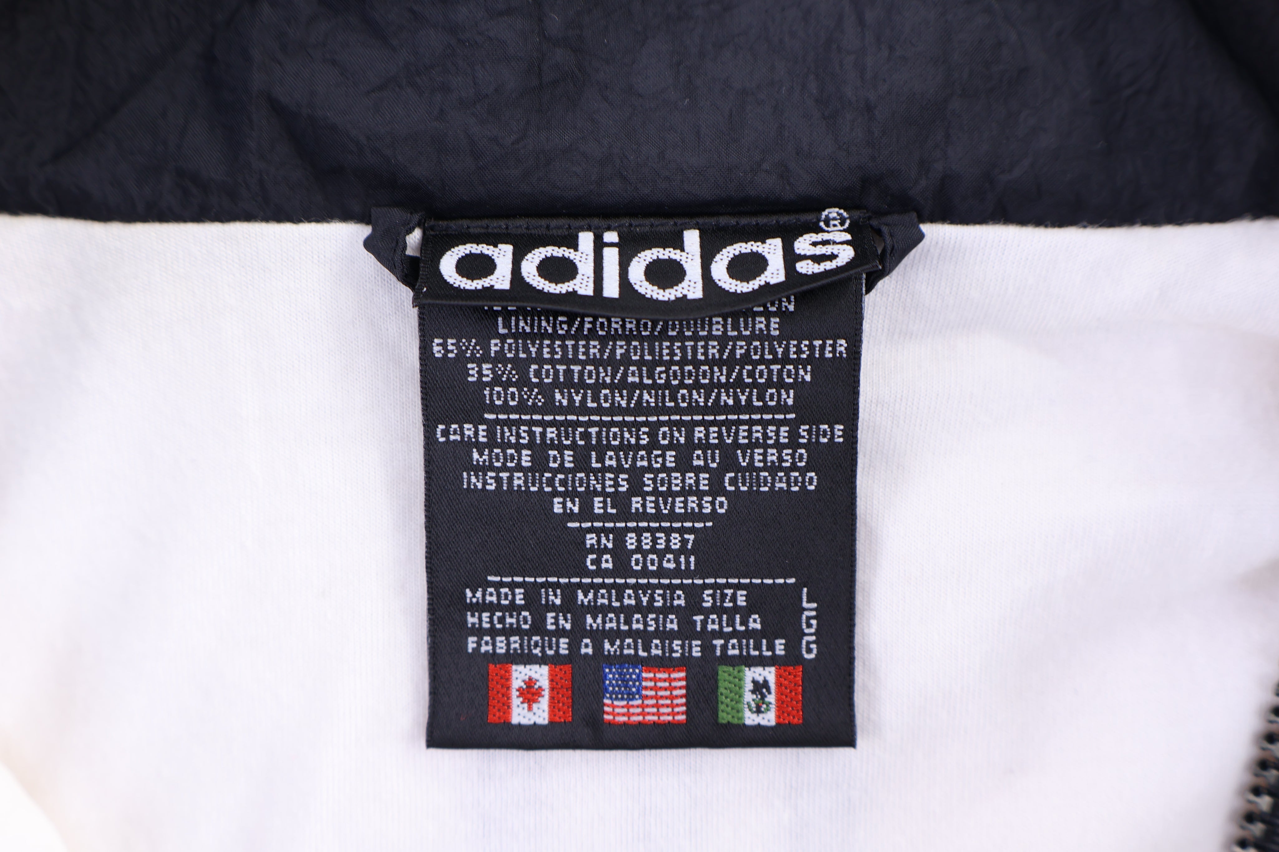 Vintage Adidas Embroidered Logo Full Zip Windbreaker Jacket