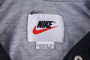 Women's 90's Nike Embroidered Logo Full Snap Windbreaker