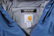 Carhartt Logo Patch Blue & Grey Storm Defender Zip Up Jacket - ThriftedThreads.com