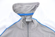 Nike Embroidered Logo Grey, Blue, & White Track Jacket - Jacket - Thrifted Threads
