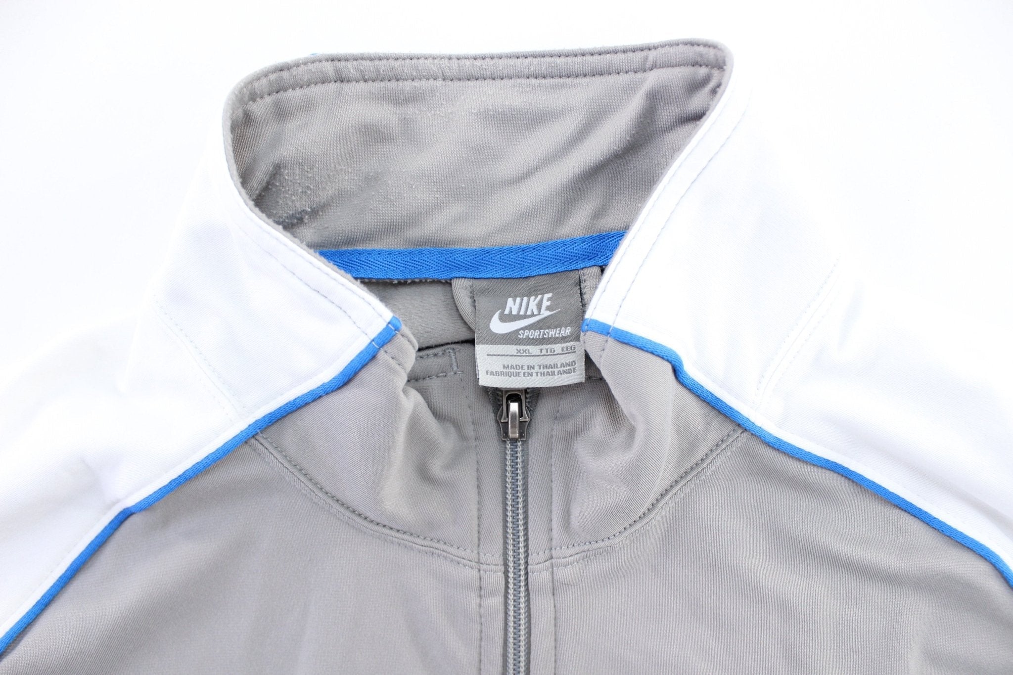 Nike Embroidered Logo Grey, Blue, & White Track Jacket - Jacket - Thrifted Threads
