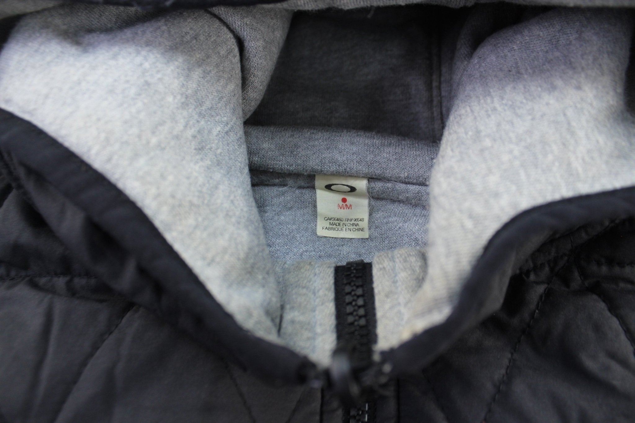 Oakley Black Quilted Hooded Zip Up Jacket - ThriftedThreads.com
