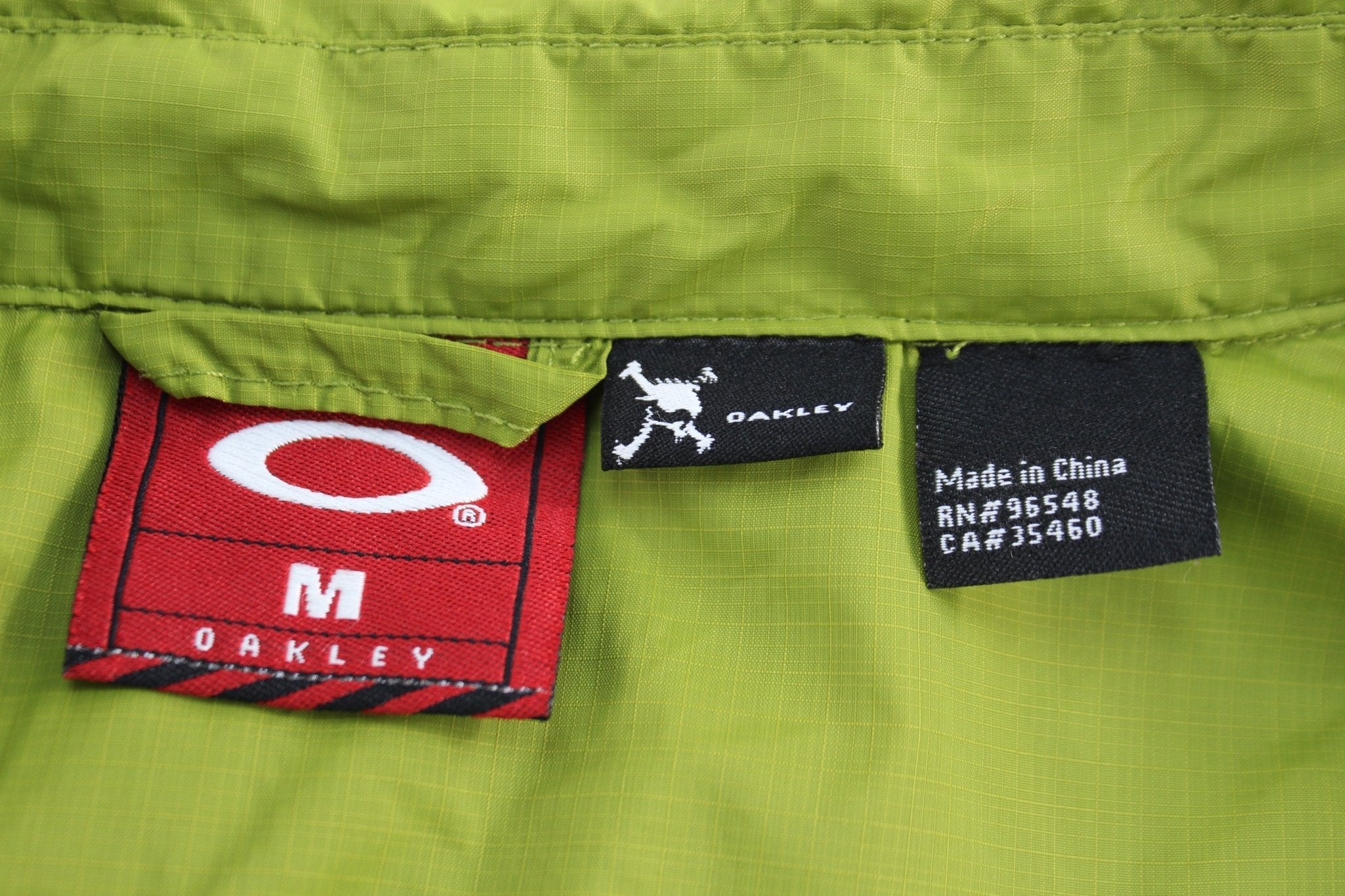 Oakley Embroidered Logo Green Windbreaker Jacket - Jackets - Thrifted Threads
