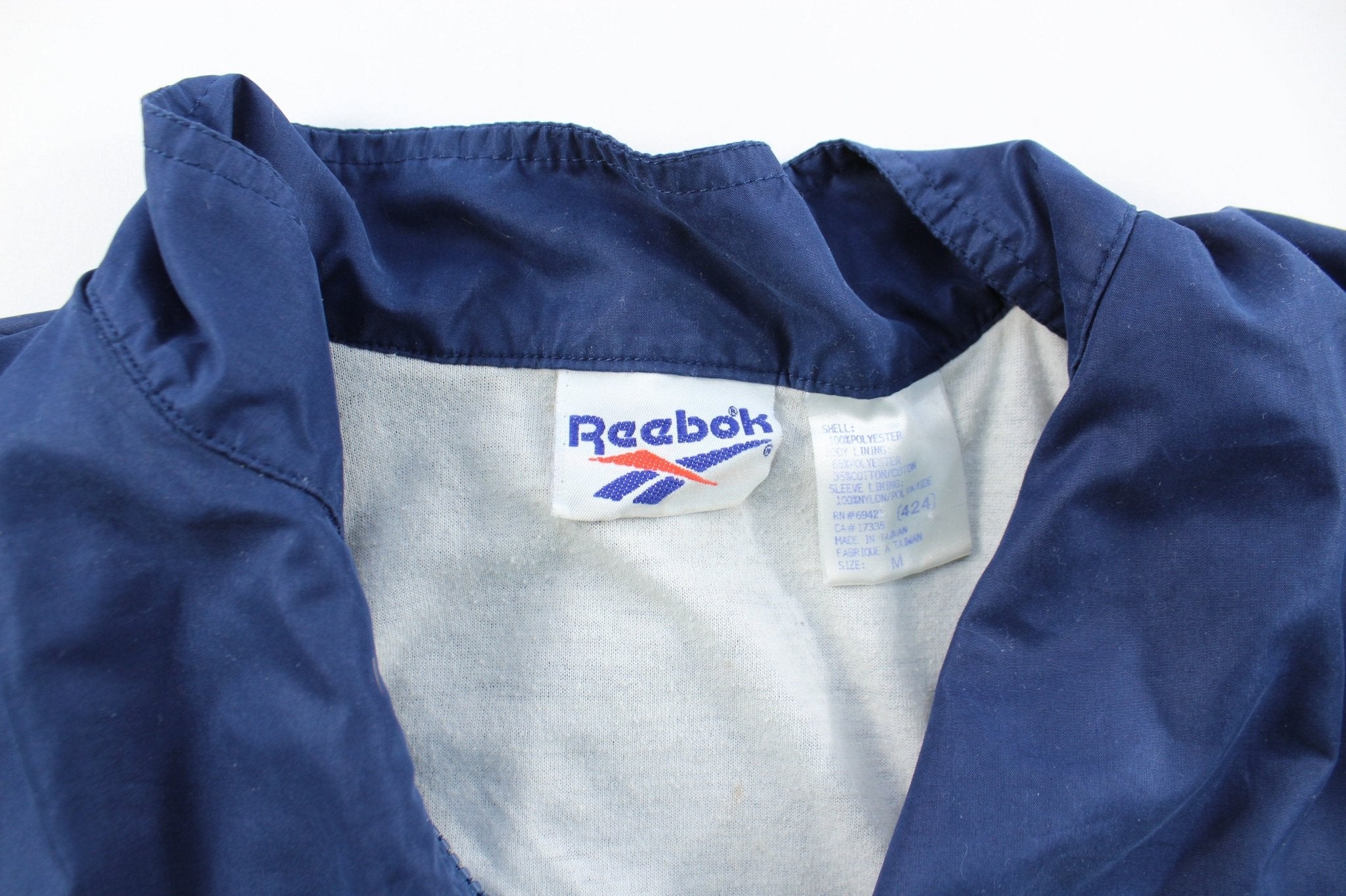 Reebok Embroidered Logo Navy Blue & Purple Zip Up Jacket - ThriftedThreads.com