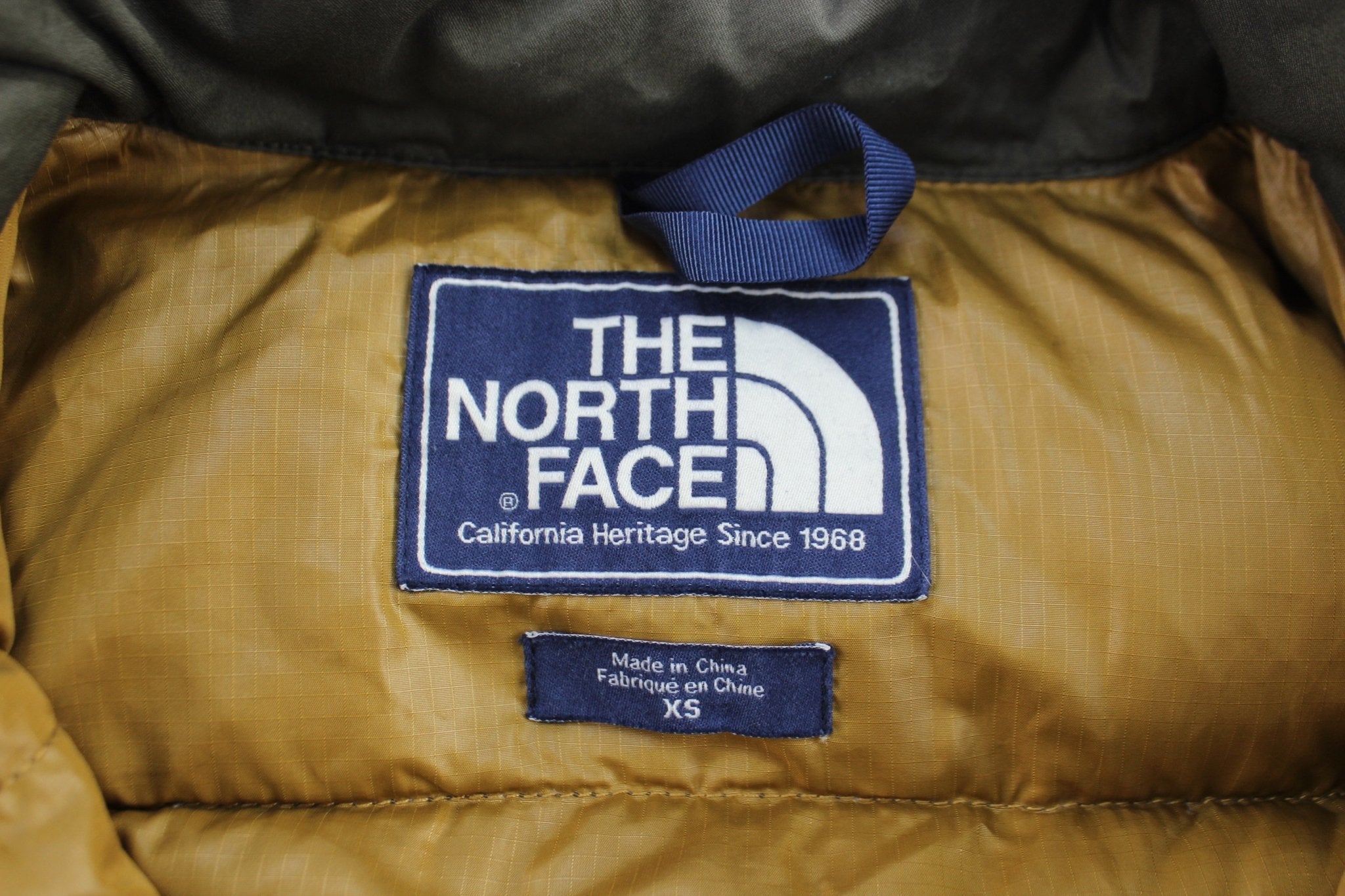 The North Face Logo Patch Green Puffer Vest - ThriftedThreads.com