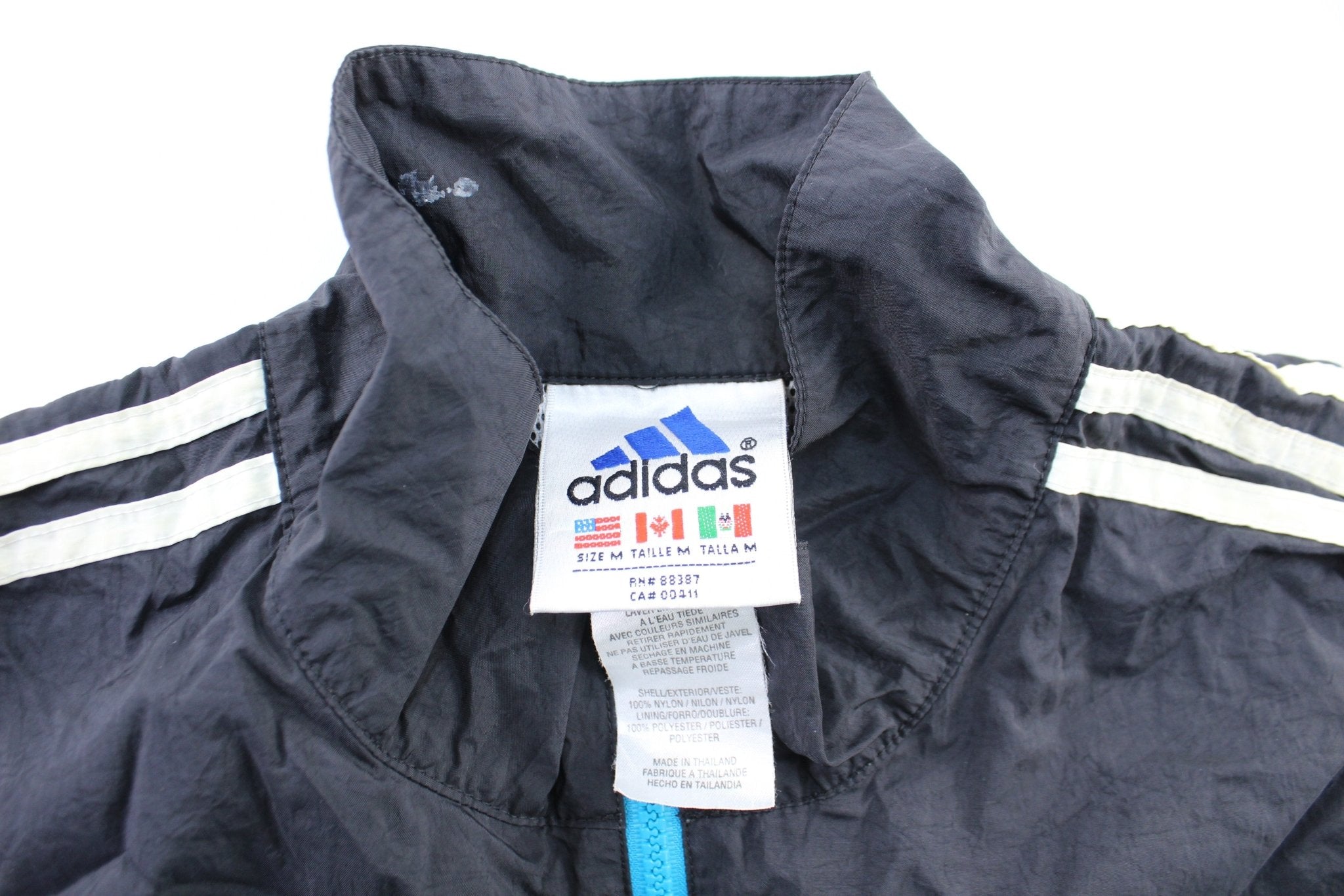 Vintage Adidas Embroidered Logo Black, White, & Aqua Striped Zip Up Jacket - ThriftedThreads.com