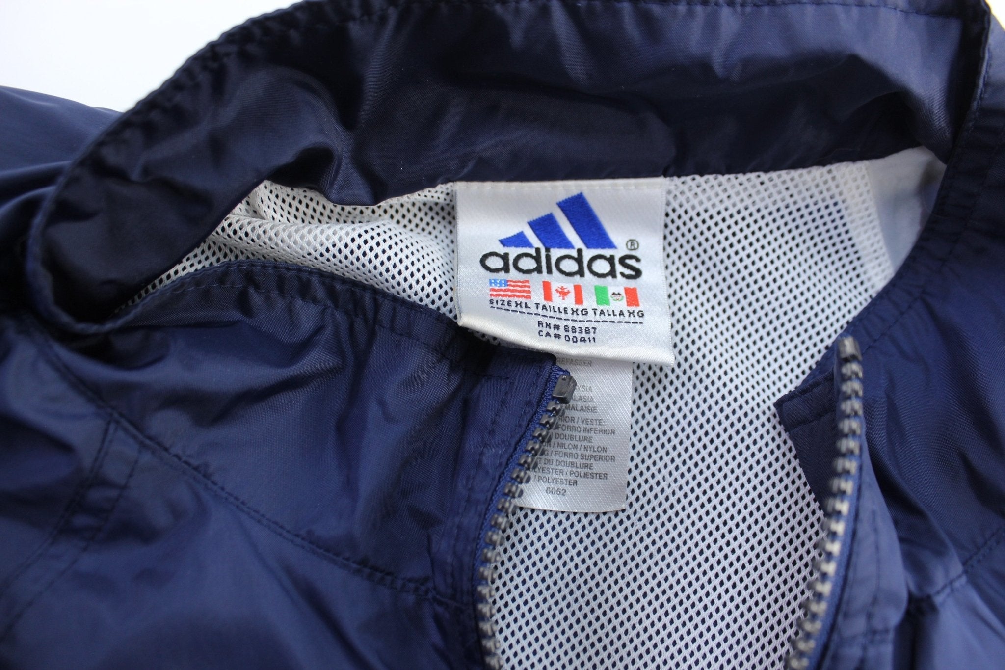 Vintage Adidas Embroidered Logo Blue & White Striped Zip Up Jacket - ThriftedThreads.com