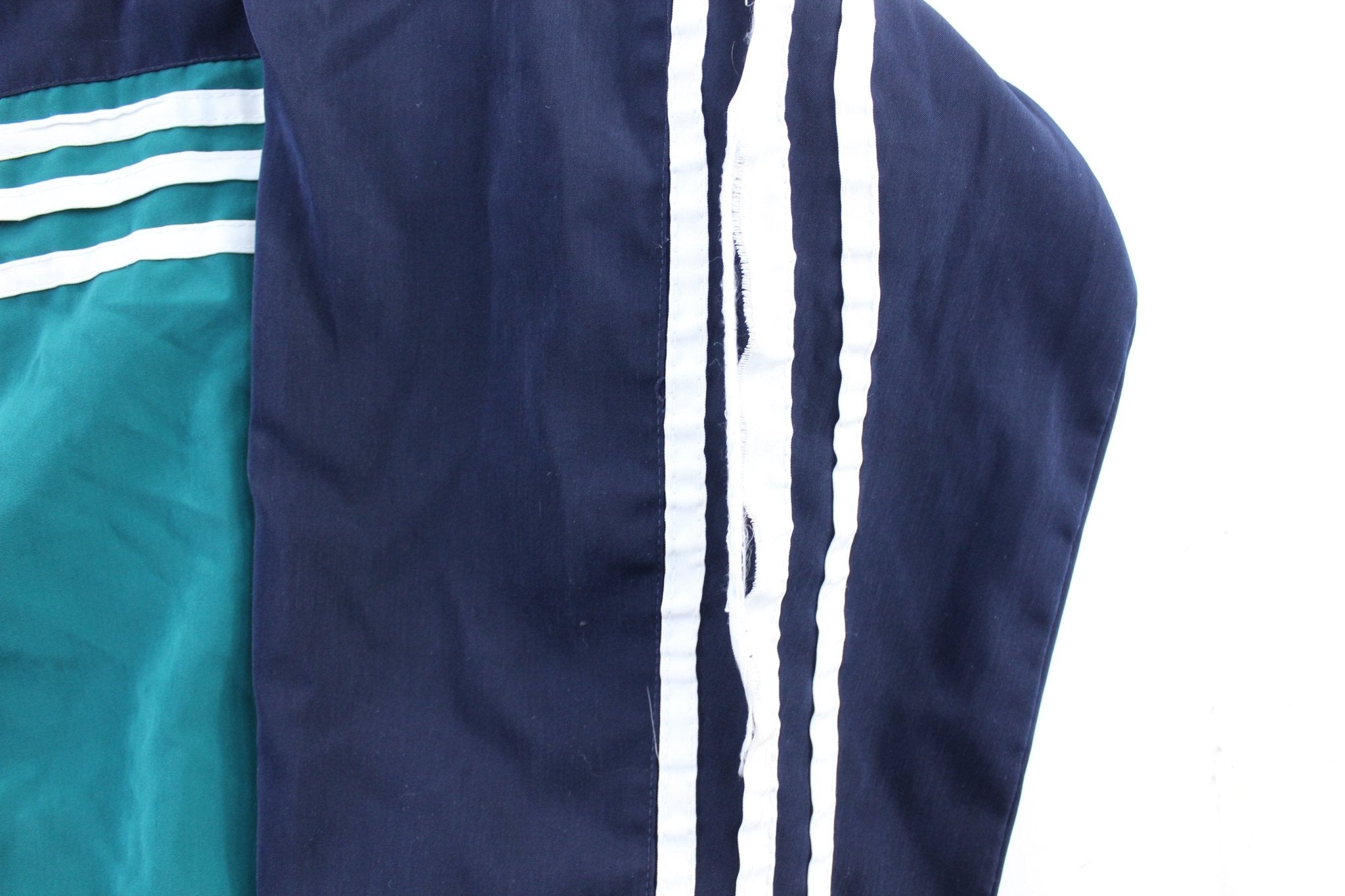 Vintage Adidas Embroidered Logo Navy Blue, Teal, & White Striped Zip Up Jacket - ThriftedThreads.com