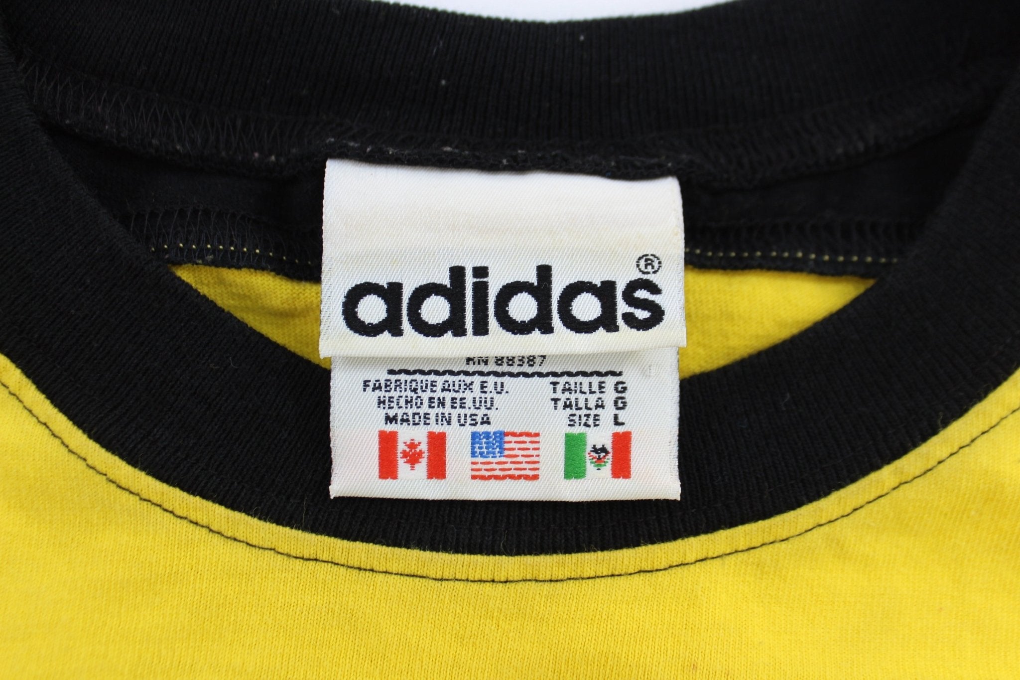 Vintage Adidas The Crew Embroidered Black & Yellow Striped T-Shirt - ThriftedThreads.com