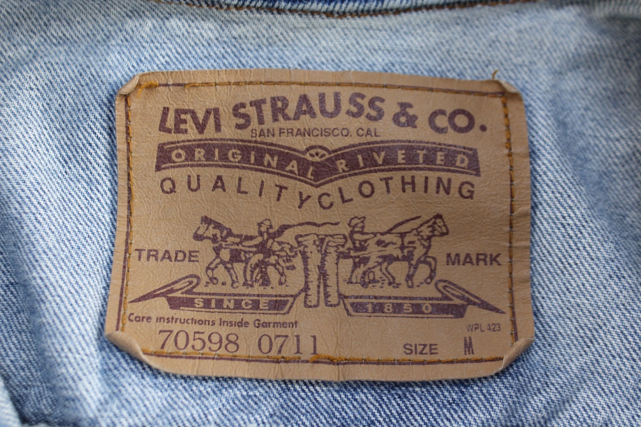 Vintage Levi's Medium Wash Denim Trucker Jacket - ThriftedThreads.com