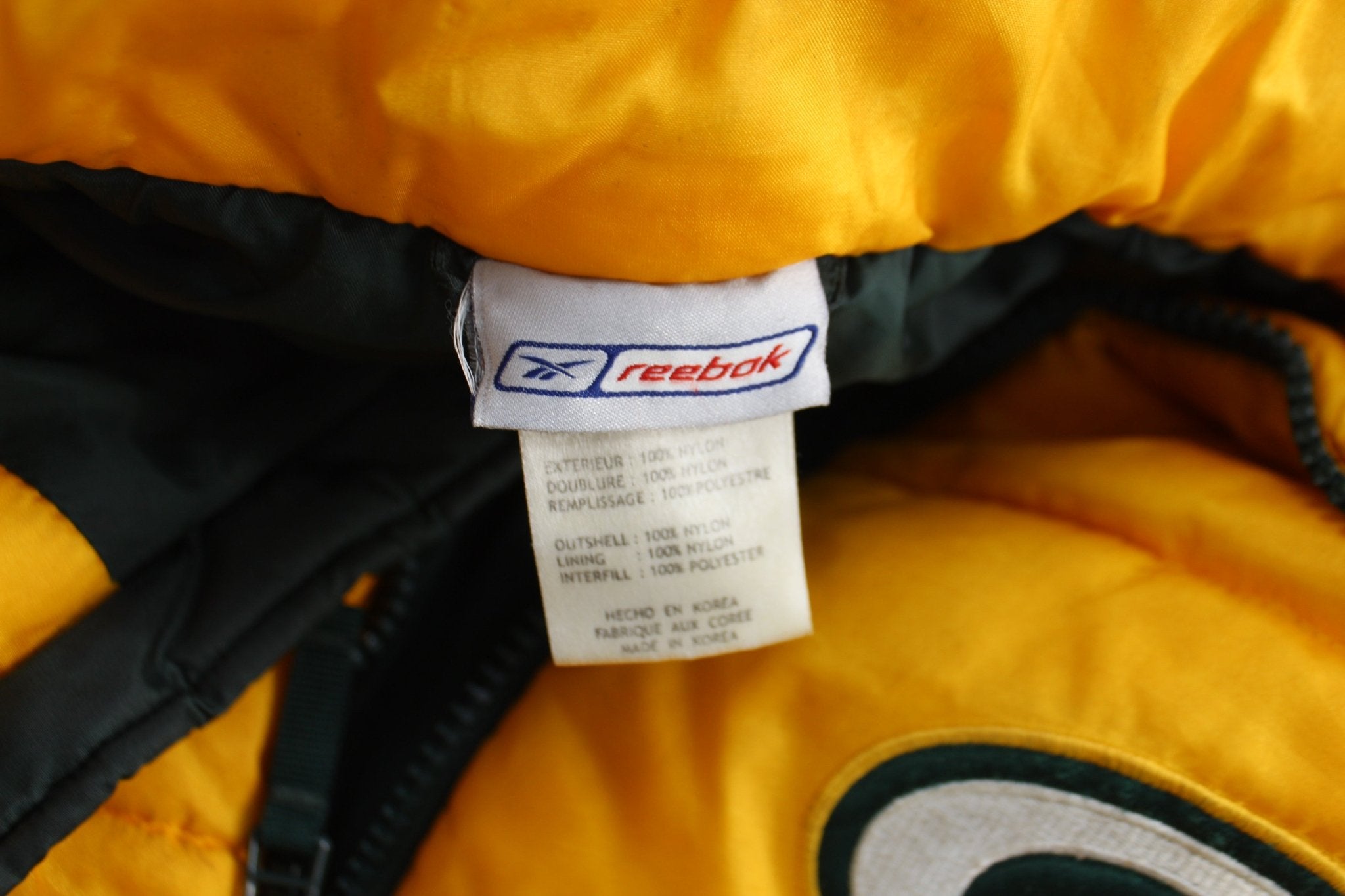 Vintage Reebok Embroidered Green Bay Packers Puffer Jacket - ThriftedThreads.com