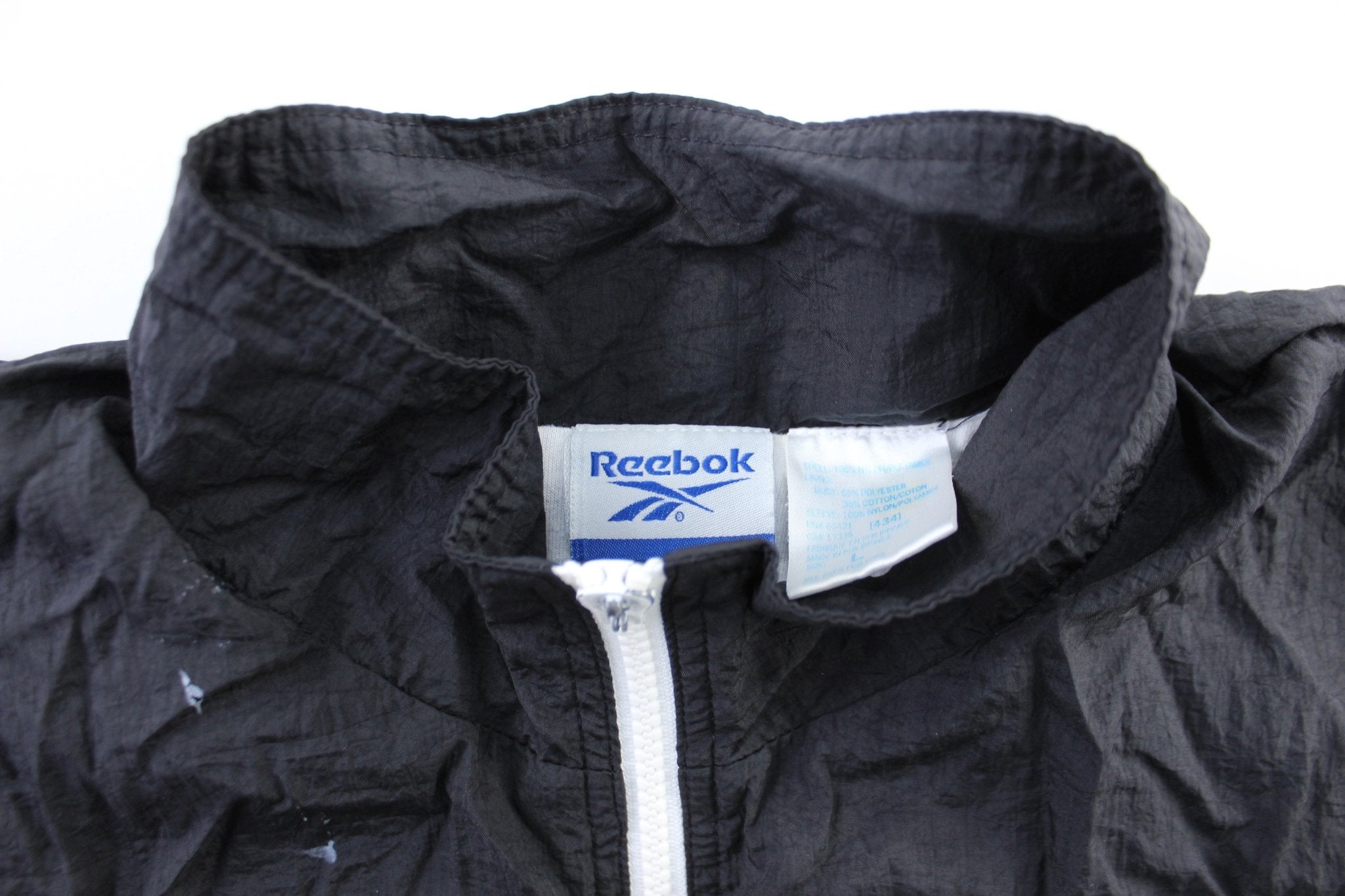 Vintage Reebok Embroidered Logo Black & White Striped Zip Up Jacket - ThriftedThreads.com