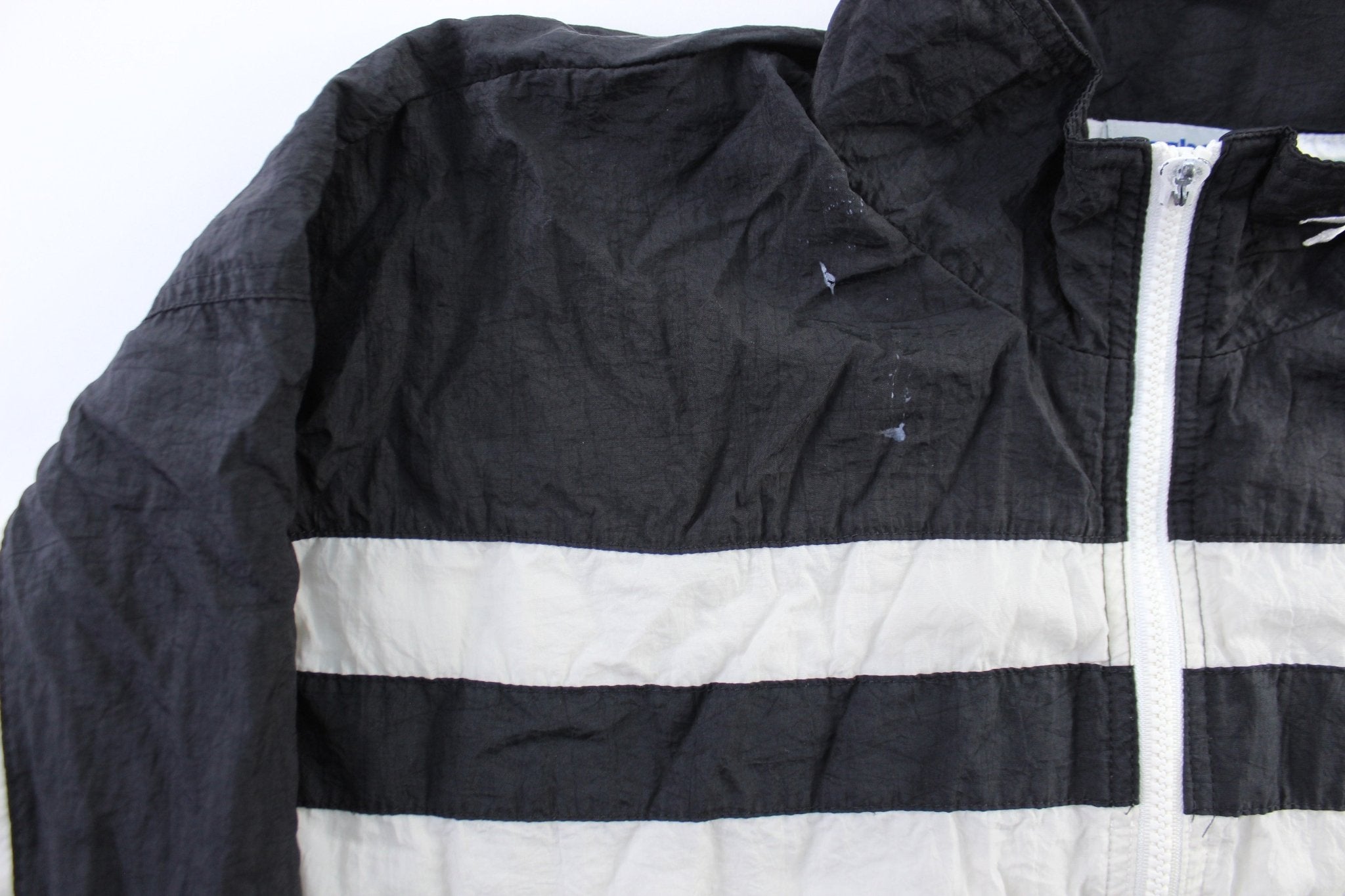 Vintage Reebok Embroidered Logo Black & White Striped Zip Up Jacket - ThriftedThreads.com
