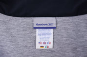 Vintage Reebok Embroidered Logo Blue & Black Zip Up Jacket - Jacket - Thrifted Threads