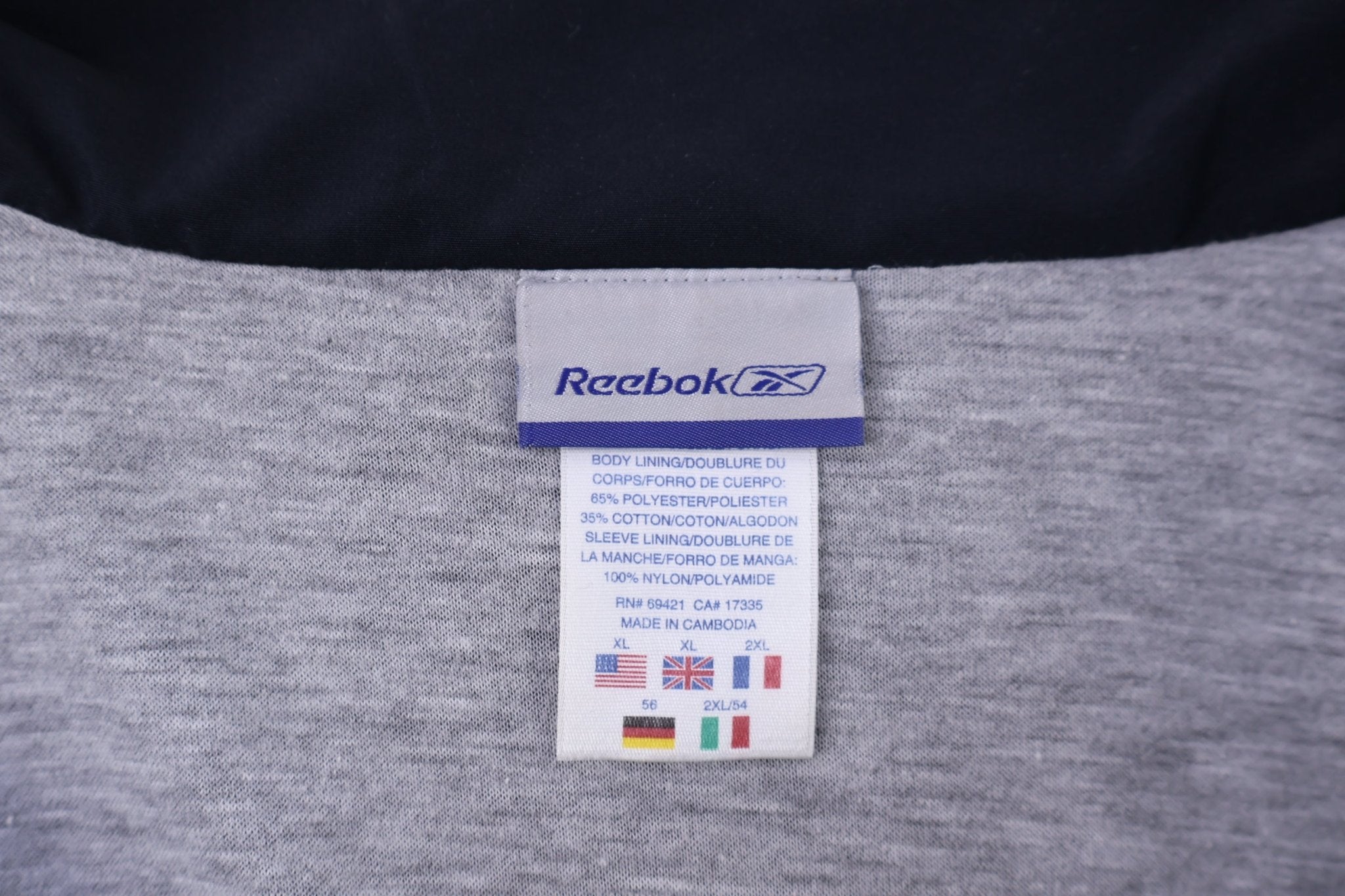 Vintage Reebok Embroidered Logo Blue & Black Zip Up Jacket - Jacket - Thrifted Threads