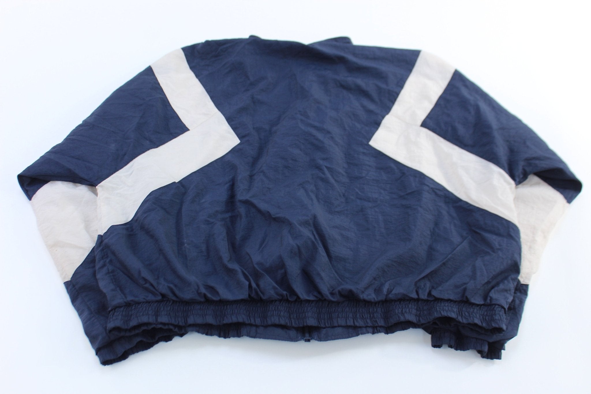 Vintage Reebok Embroidered Logo Blue & White Windbreaker Jacket - ThriftedThreads.com