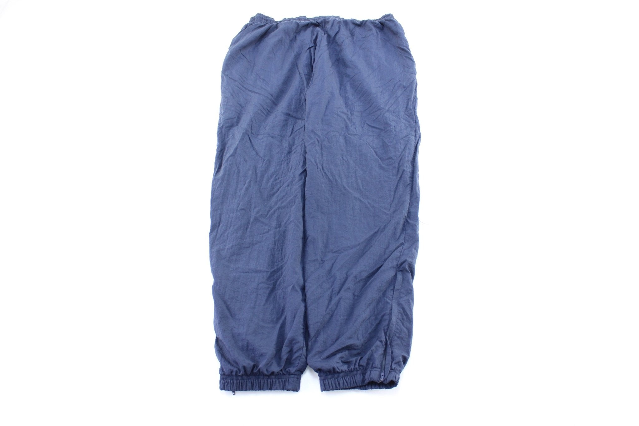 Vintage Reebok Embroidered Logo Navy Blue Windbreaker Pants - ThriftedThreads.com