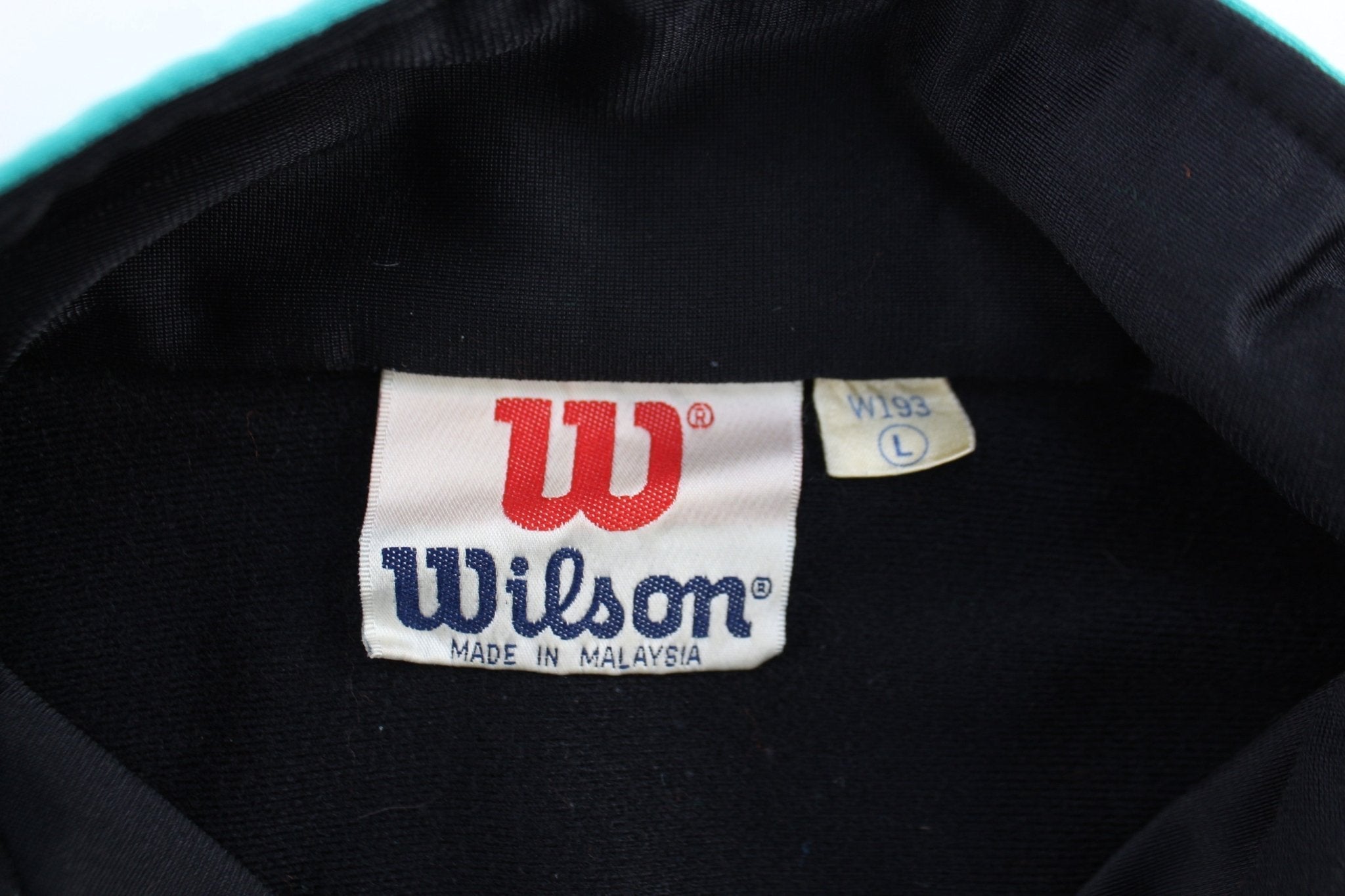 Vintage Wilson Embroidered Logo Blue, Black ,& White Track Jacket - Jackets - Thrifted Threads