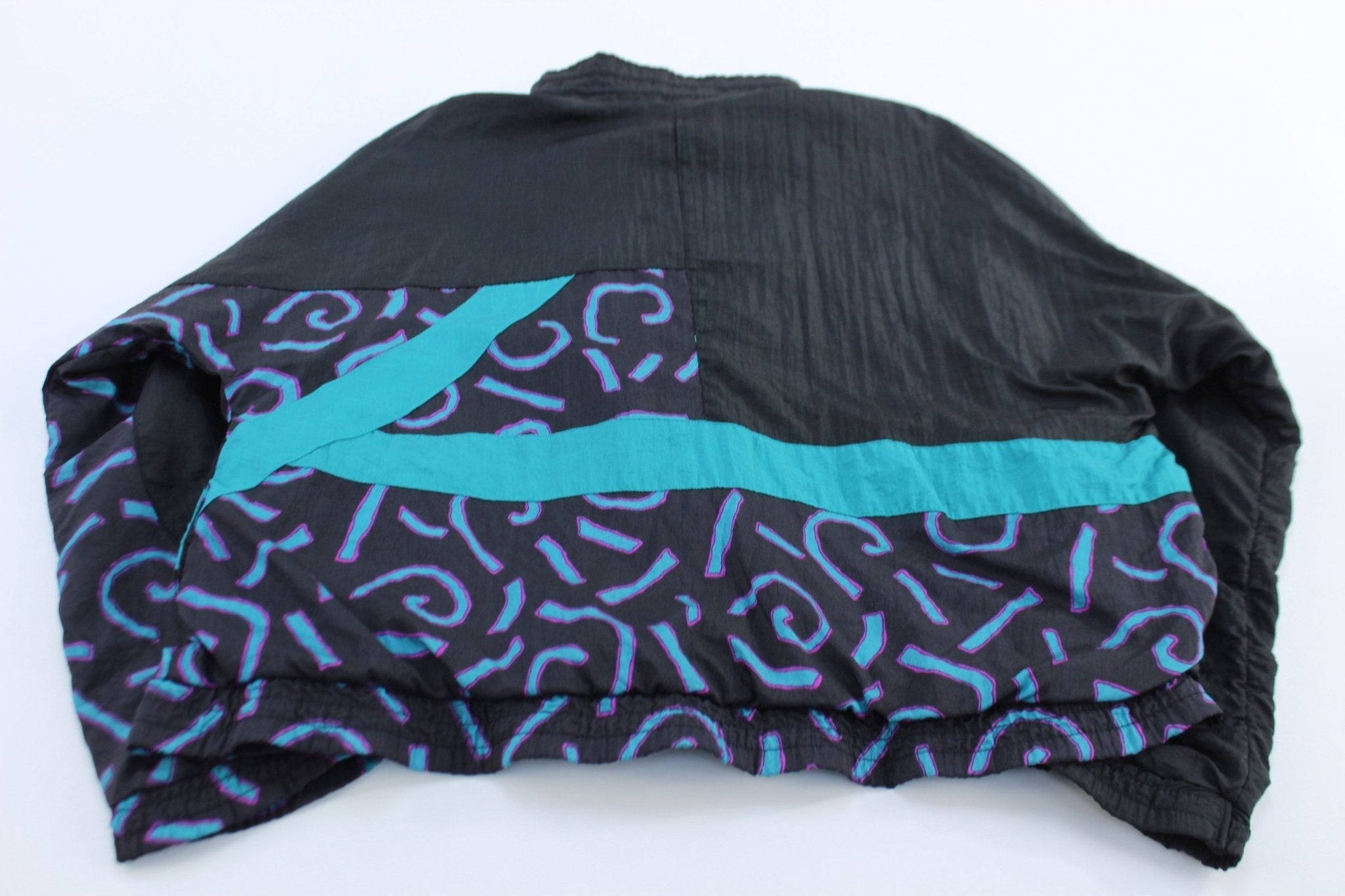 Women's 90's Reebok Embroidered Logo Abstract Windbreaker Jacket - Jackets - Thrifted Threads