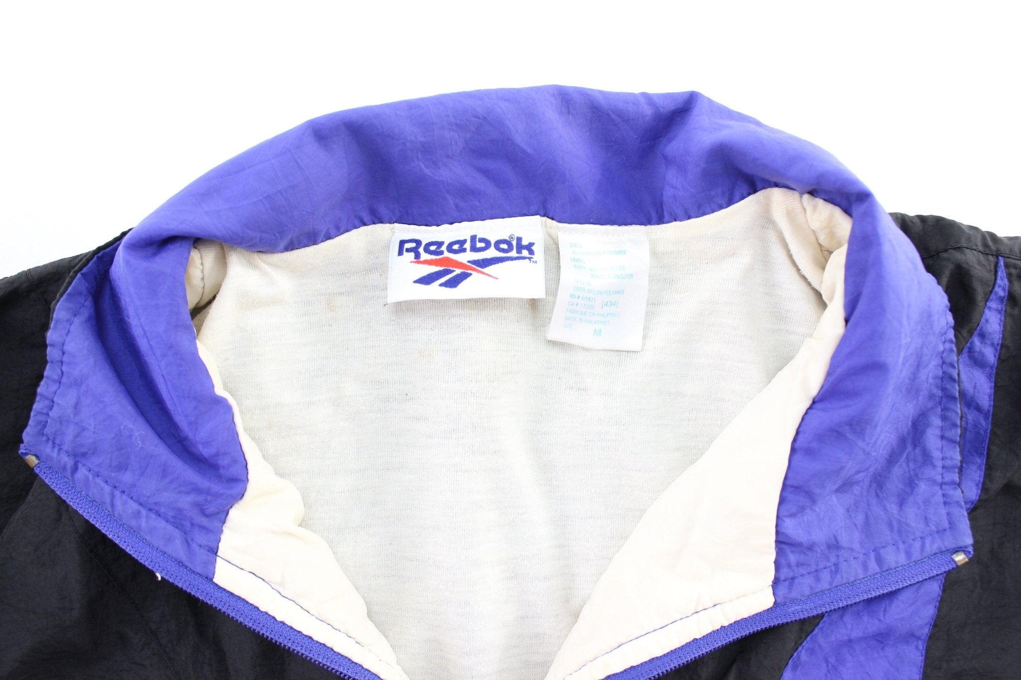 Women's 90's Reebok Embroidered Logo Black, Blue, & White Zip Up Jacket - ThriftedThreads.com