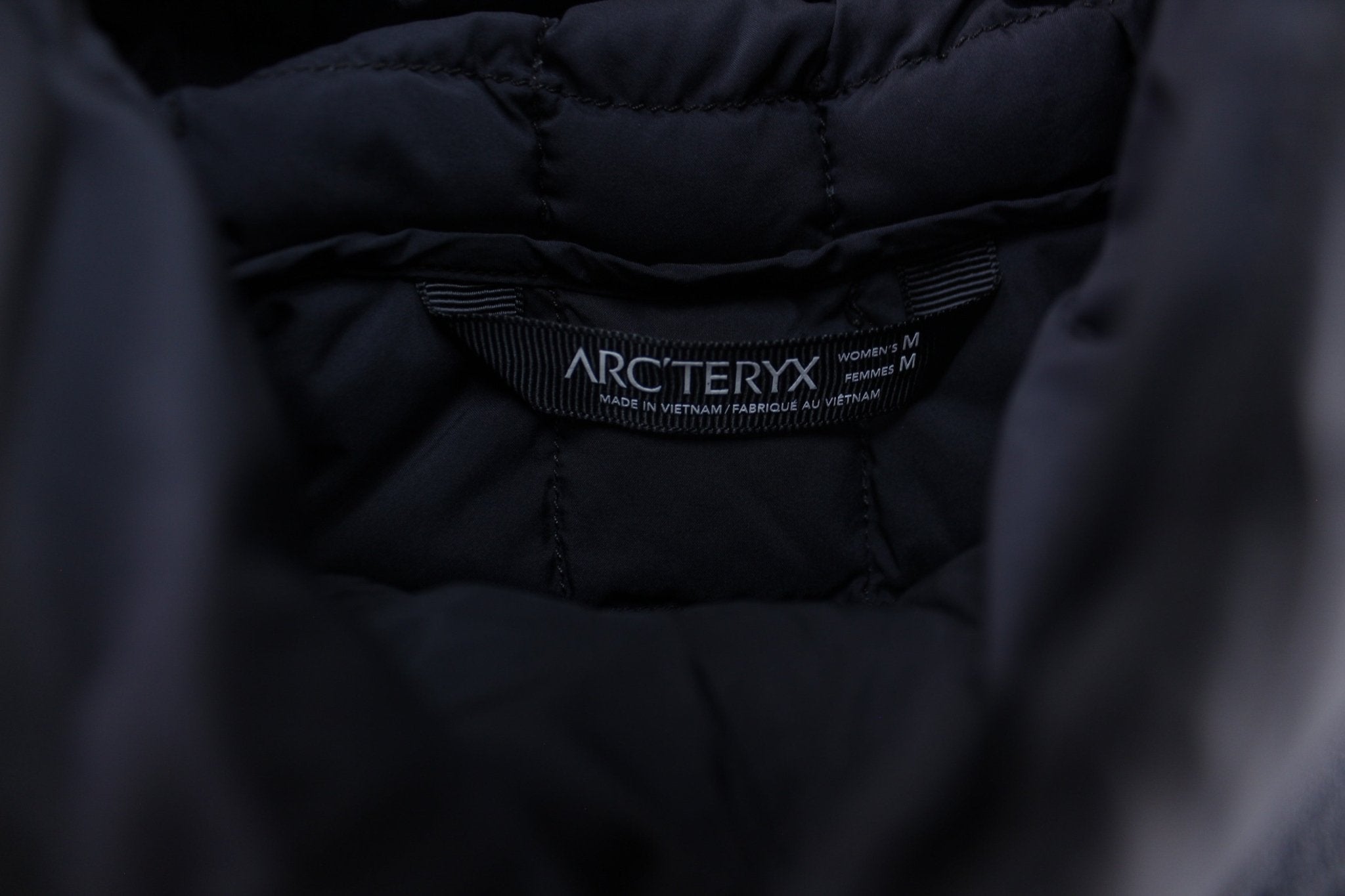 Women's Arc'teryx Logo Black Hooded Puffer Vest - ThriftedThreads.com