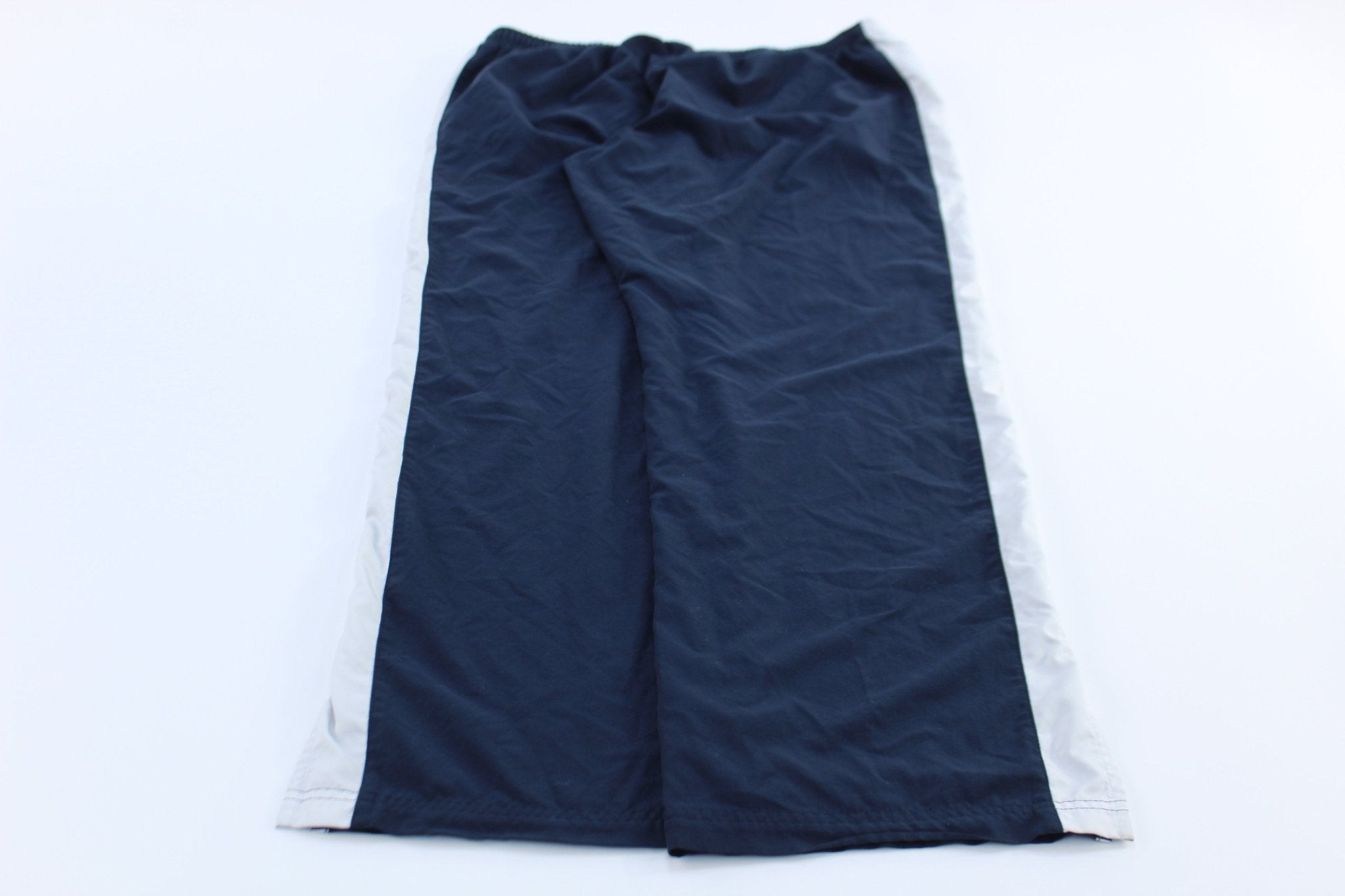 Women's Nike Embroidered Swoosh Logo Blue & White Striped Pants - ThriftedThreads.com