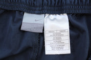 Women's Nike Embroidered Swoosh Logo Blue & White Striped Pants - ThriftedThreads.com