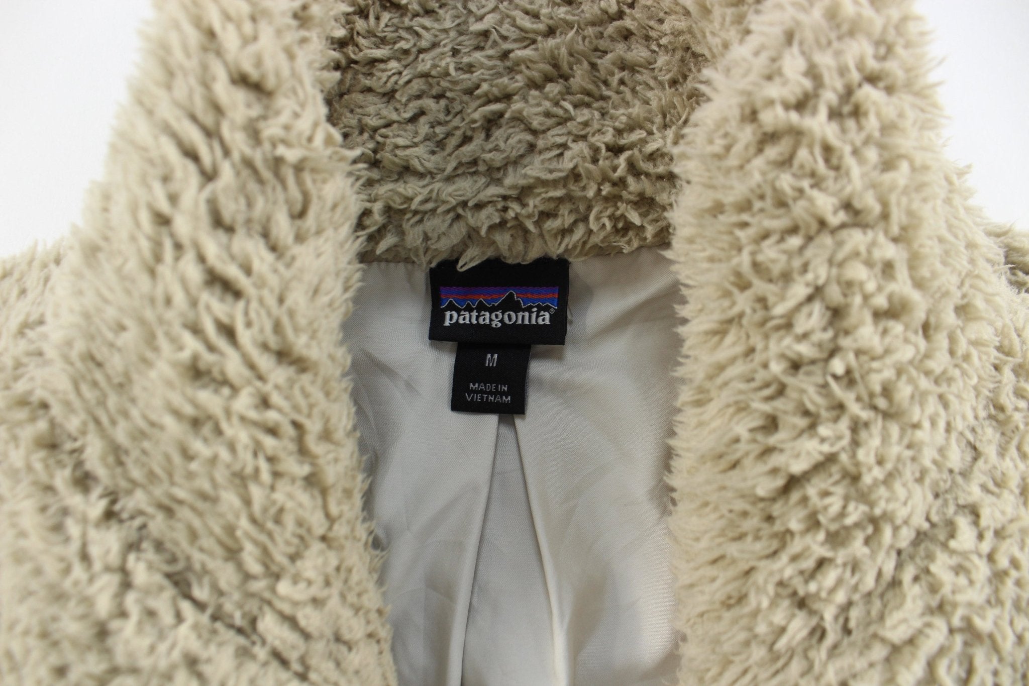 Women's Patagonia Logo Patch Beige Zip Up Vest - ThriftedThreads.com