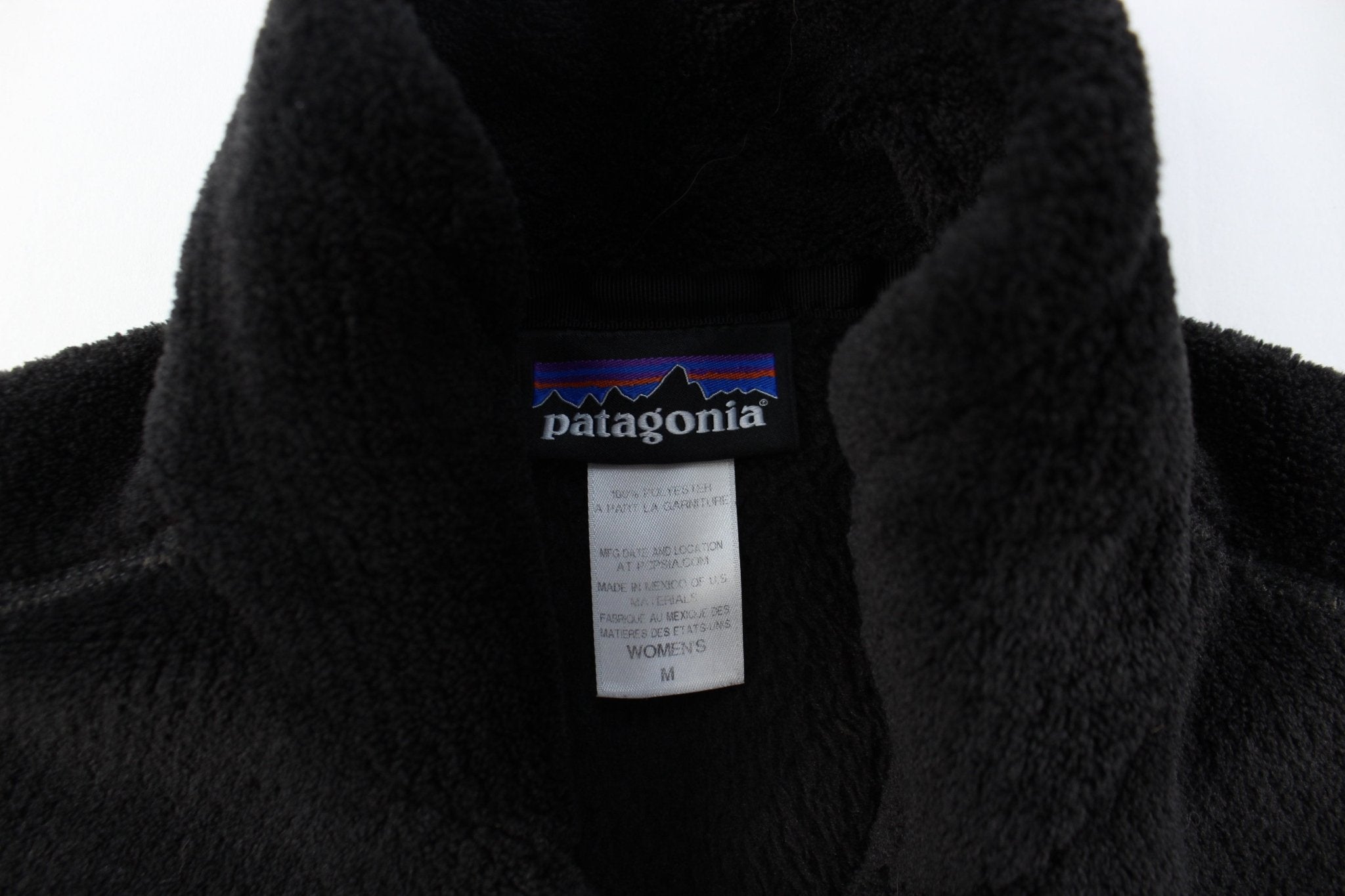 Women's Patagonia Logo Patch Black Zip Up Vest - ThriftedThreads.com