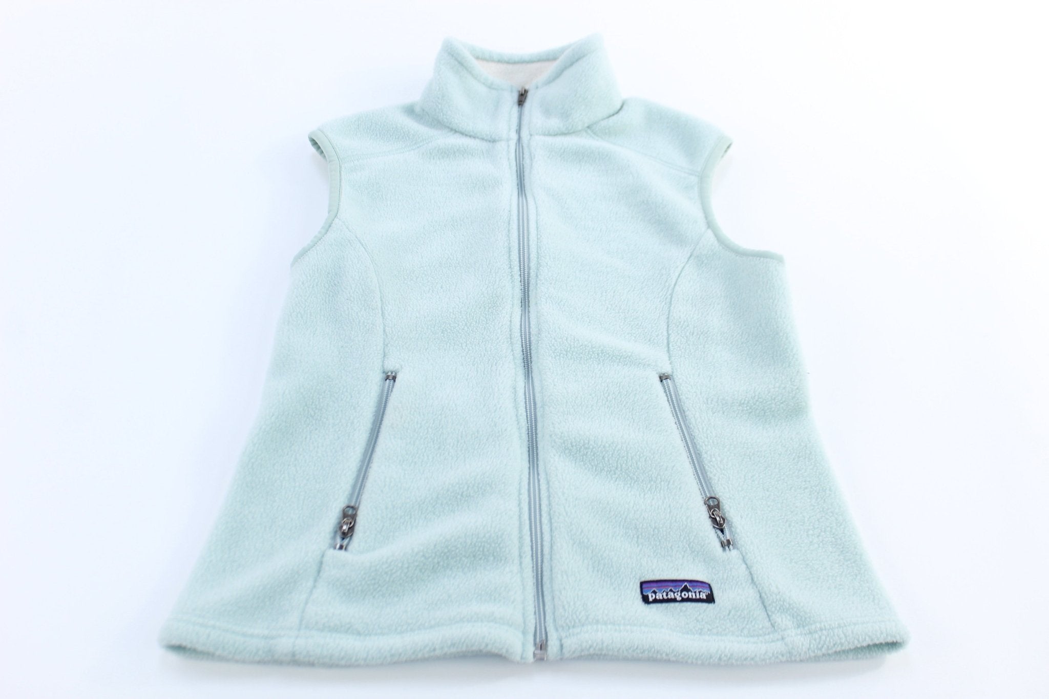Women's Patagonia Logo Patch Light Blue Fleece Zip Up Vest - ThriftedThreads.com