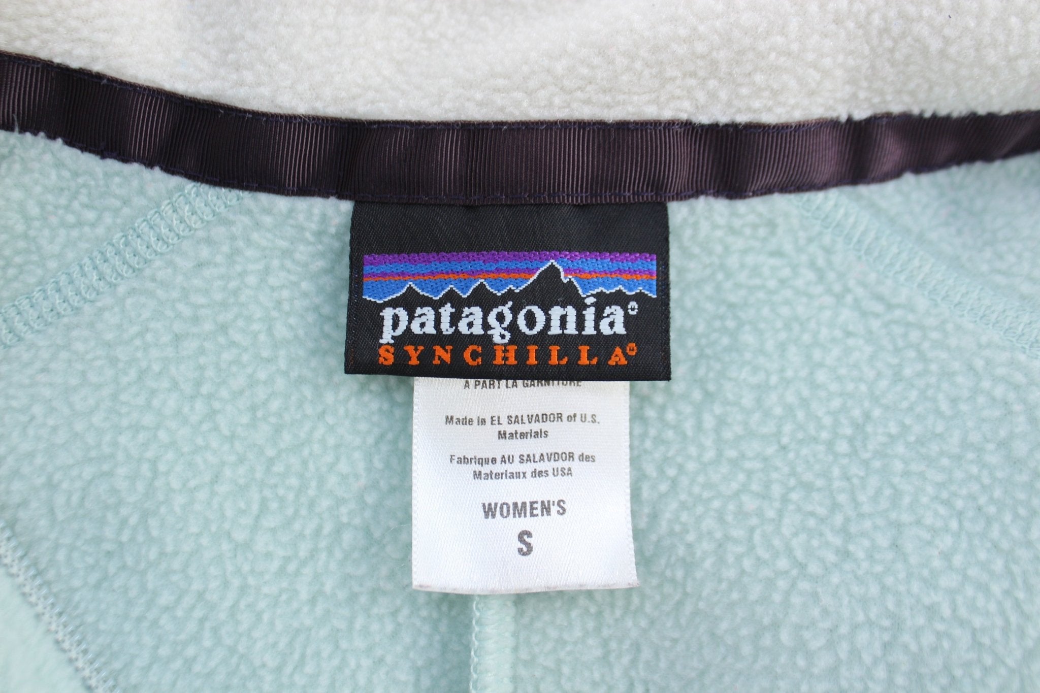 Women's Patagonia Logo Patch Light Blue Fleece Zip Up Vest - ThriftedThreads.com
