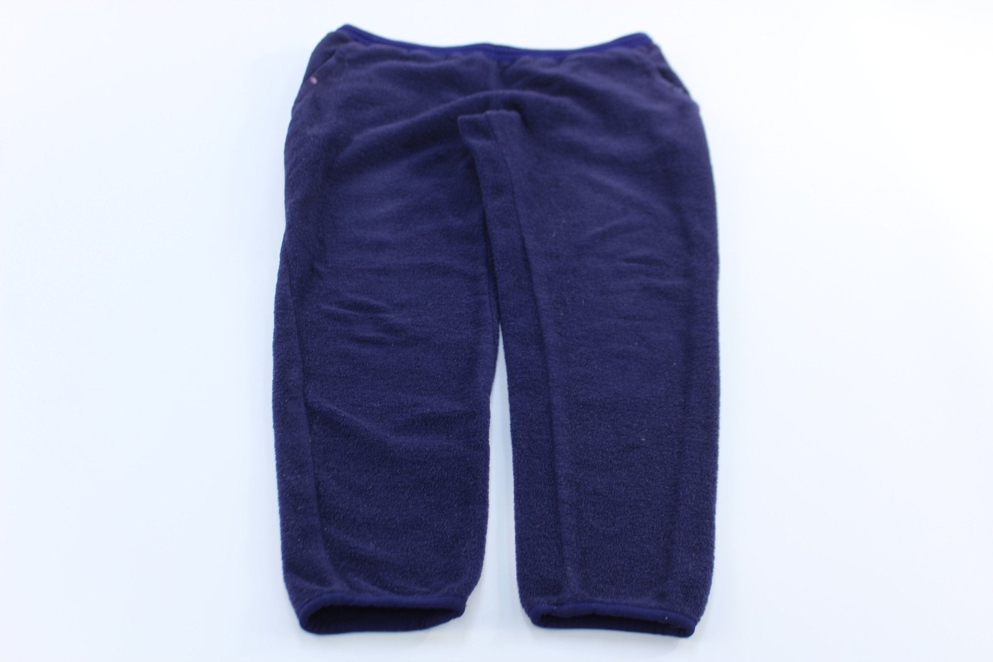 Women's Patagonia Logo Patch Purple Fleece Pants - ThriftedThreads.com