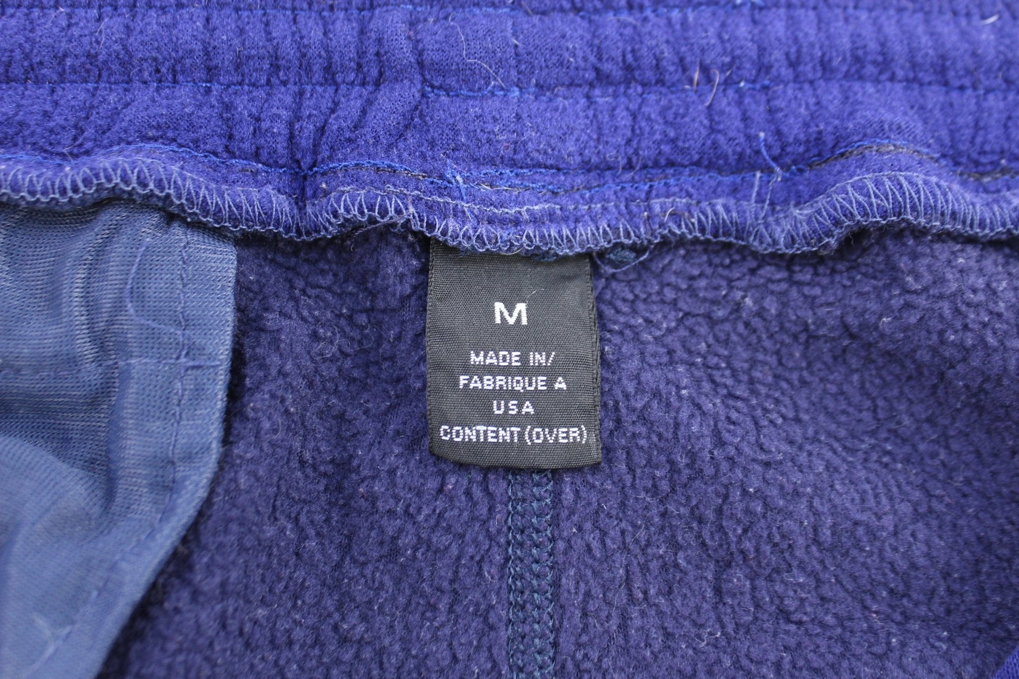 Women's Patagonia Logo Patch Purple Fleece Pants - ThriftedThreads.com