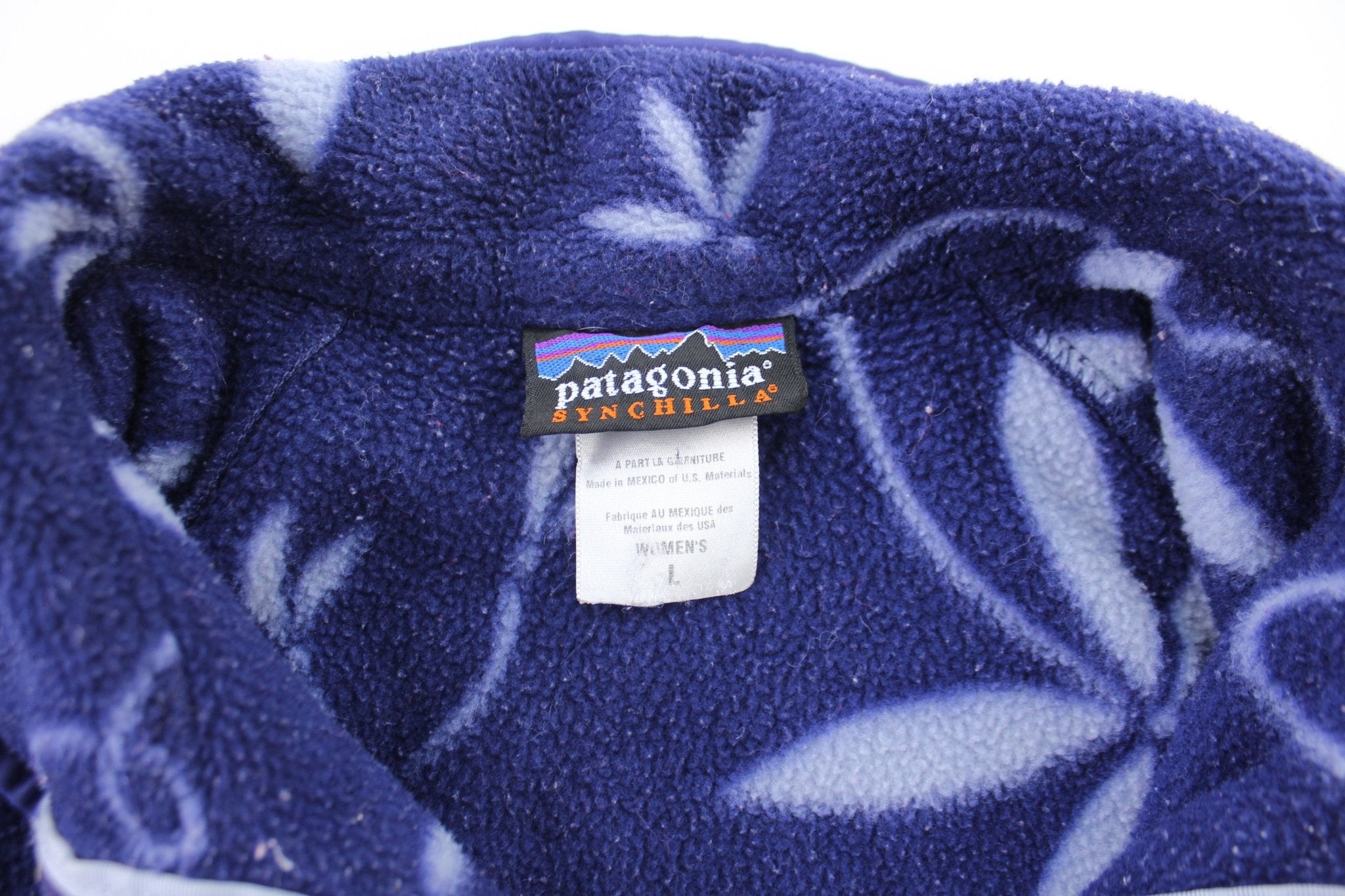 Women's Patagonia Logo Patch Purple Floral Pullover Jacket - ThriftedThreads.com