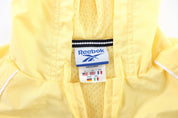 Women's Reebok Embroidered Logo Yellow Windbreaker Pullover - ThriftedThreads.com