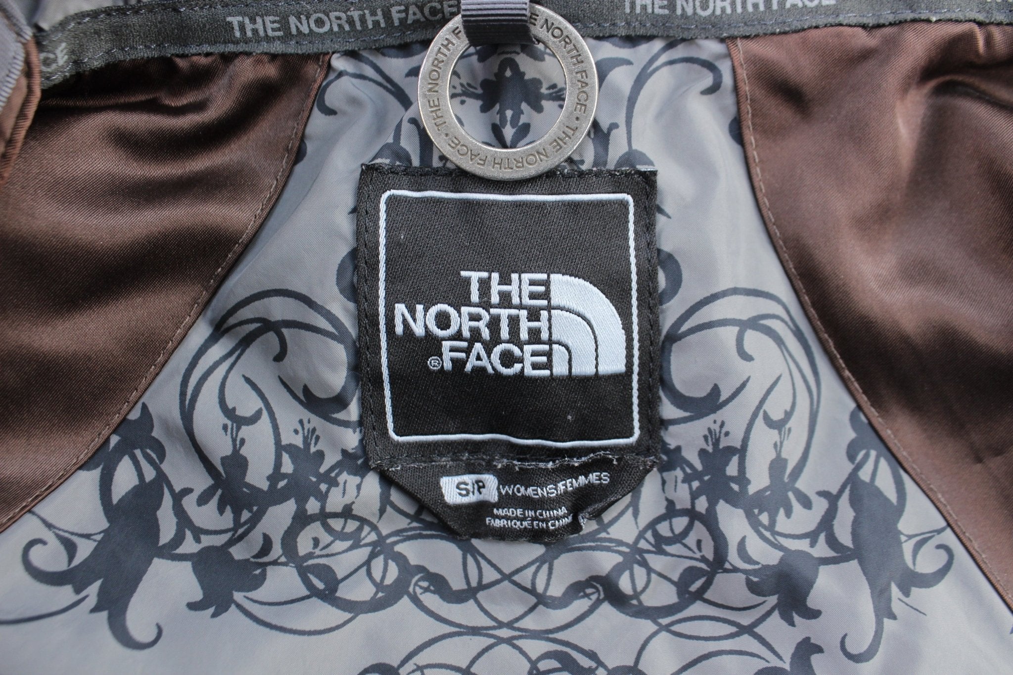 Women's The North Face 550 Embroidered Brown Puffer Vest - ThriftedThreads.com