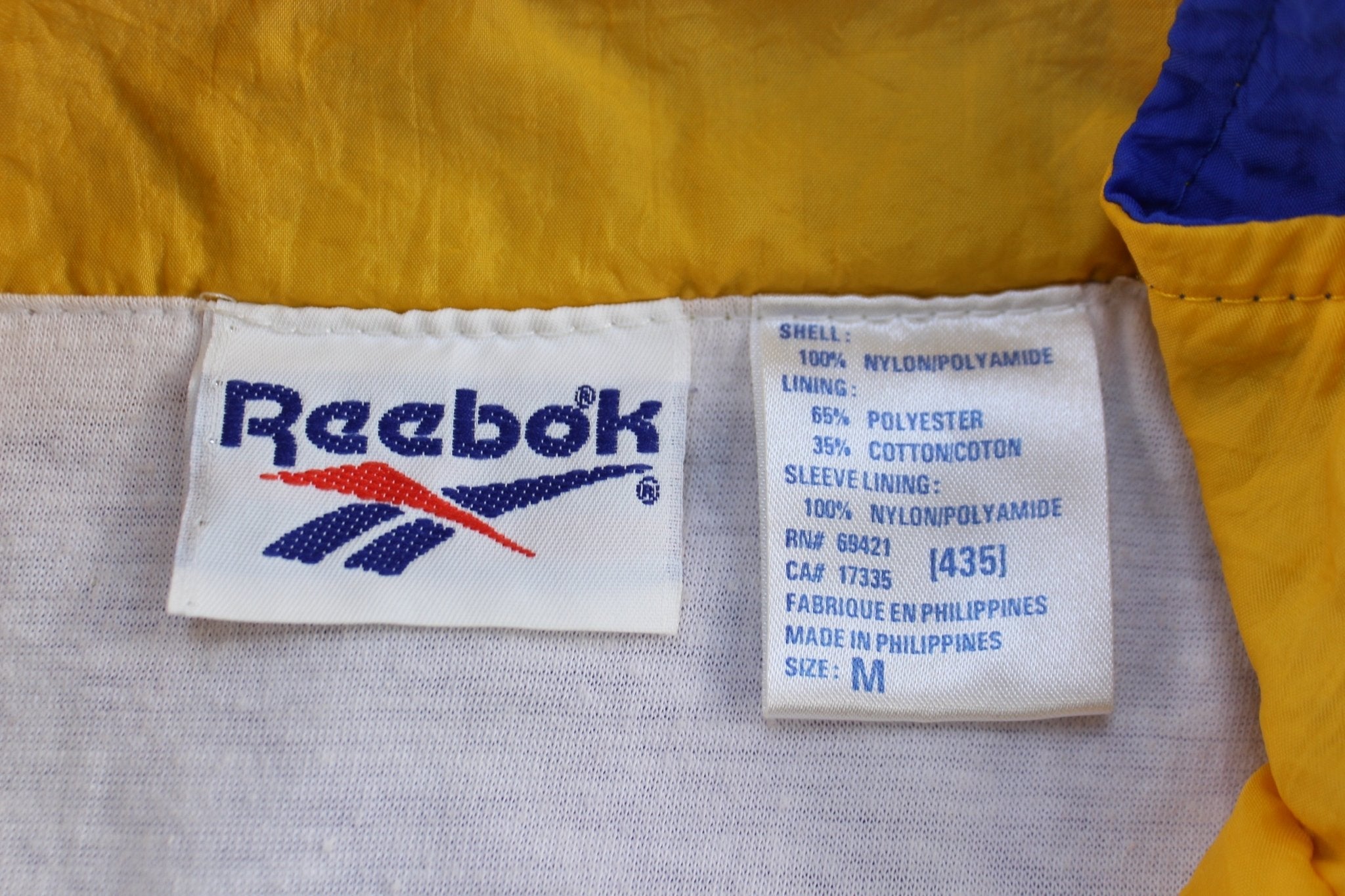 Women's Vintage Reebok Embroidered Logo Blue, Black, & Yellow Zip Up Jacket - ThriftedThreads.com