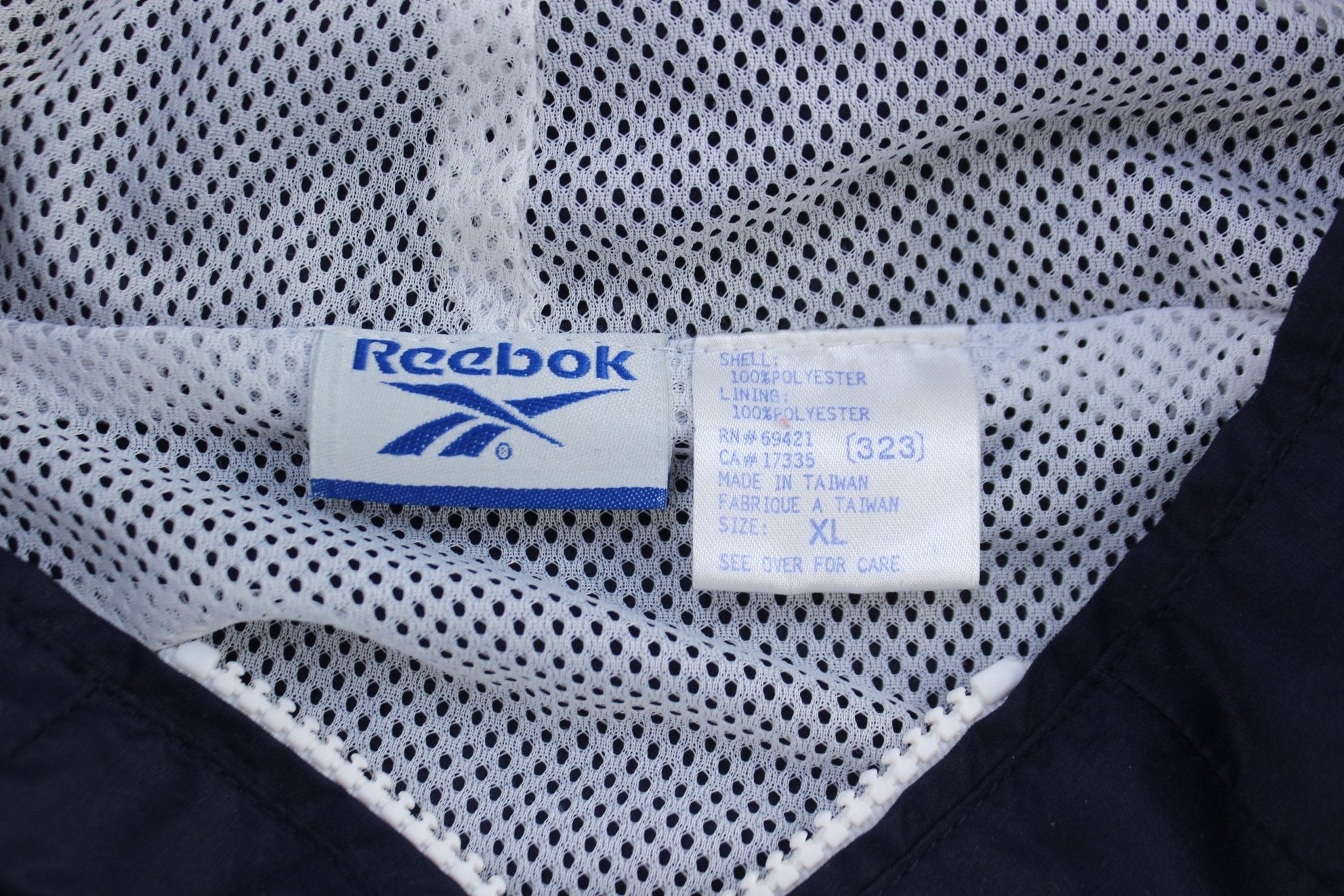 Women's Vintage Reebok Embroidered Logo Blue & White Striped Zip Up Jacket - ThriftedThreads.com