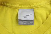 Y2K Nike Center Swoosh Logo Yellow Reach For The Prize T-Shirt - ThriftedThreads.com