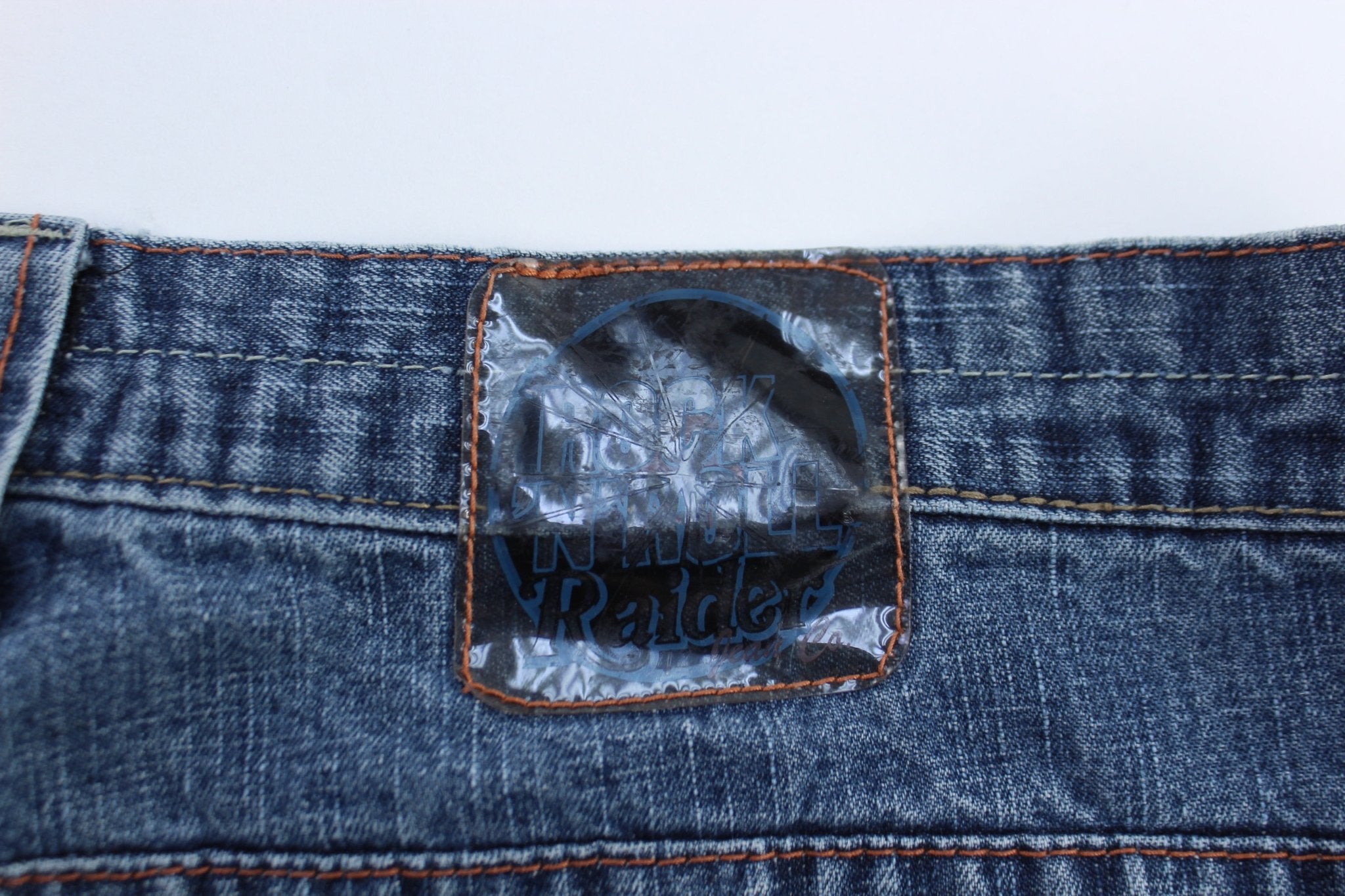 Y2K Raider Medium Wash Denim Shorts - ThriftedThreads.com