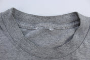Youth 90's Nike Logo Grey T-Shirt - ThriftedThreads.com