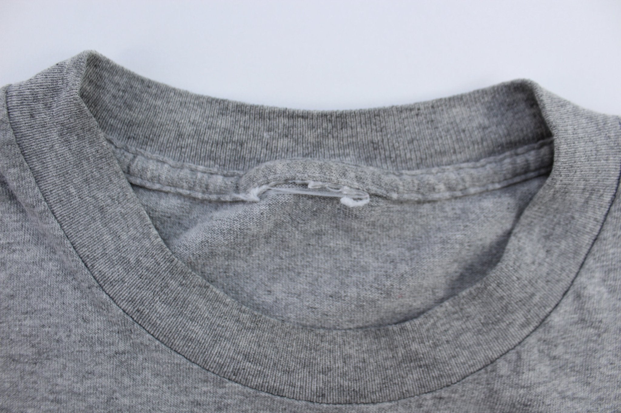 Youth 90's Nike Logo Grey T-Shirt - ThriftedThreads.com